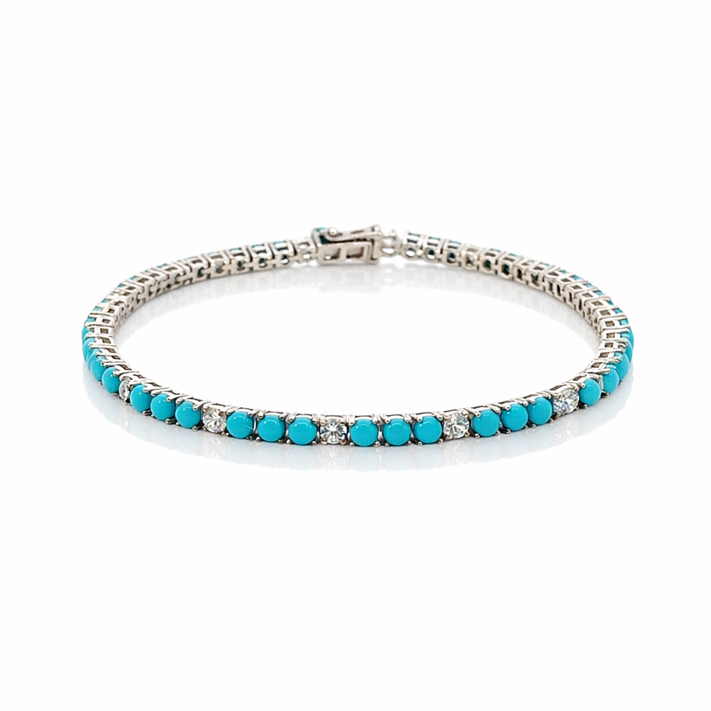 Turquoise and white zirconia bracelet on a white background