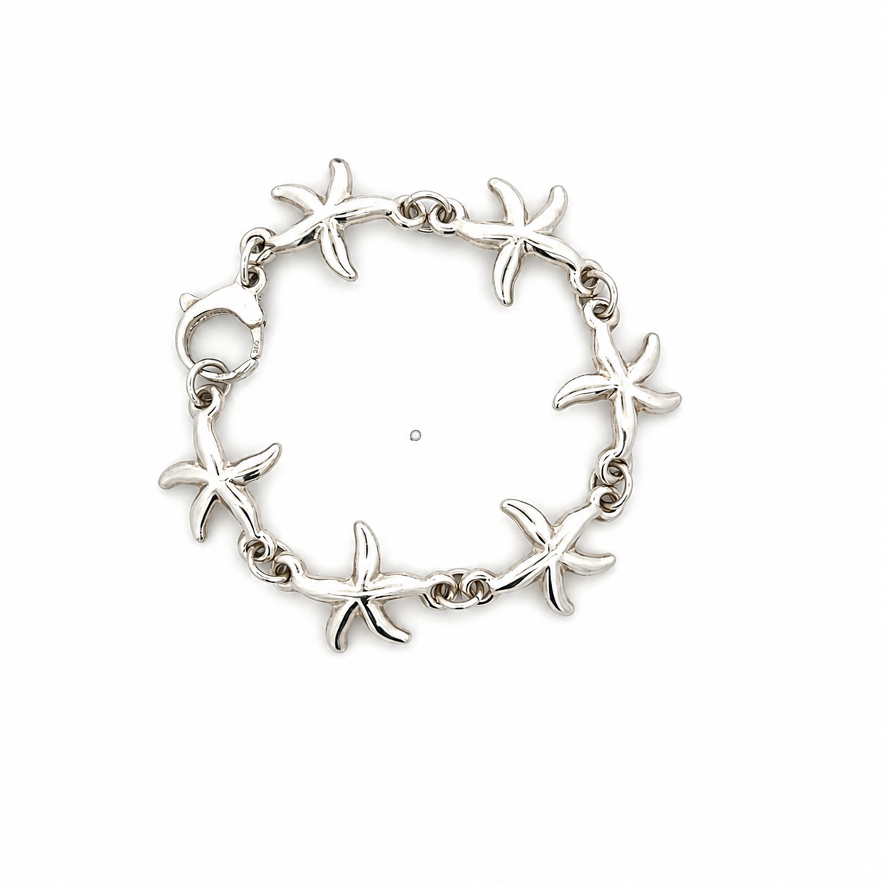 A sterling silver bracelet featuring a continuous link design of starfish, complete with a lobster clasp, shown on a plain white background.