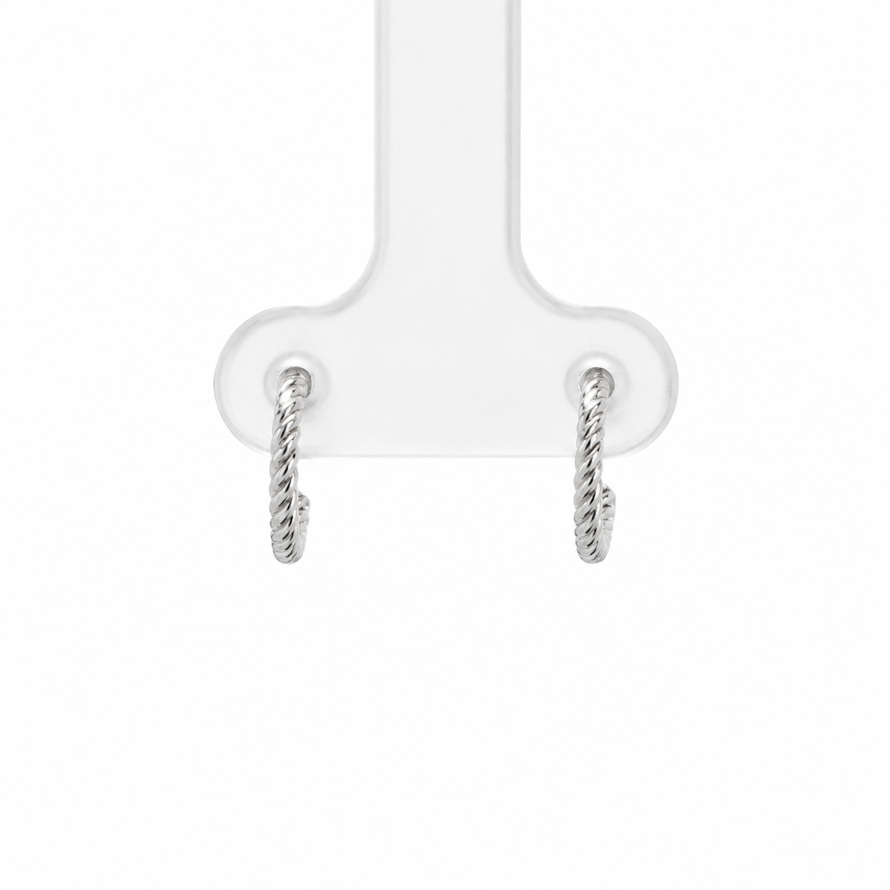 Pair of silver hoop earrings on a white background