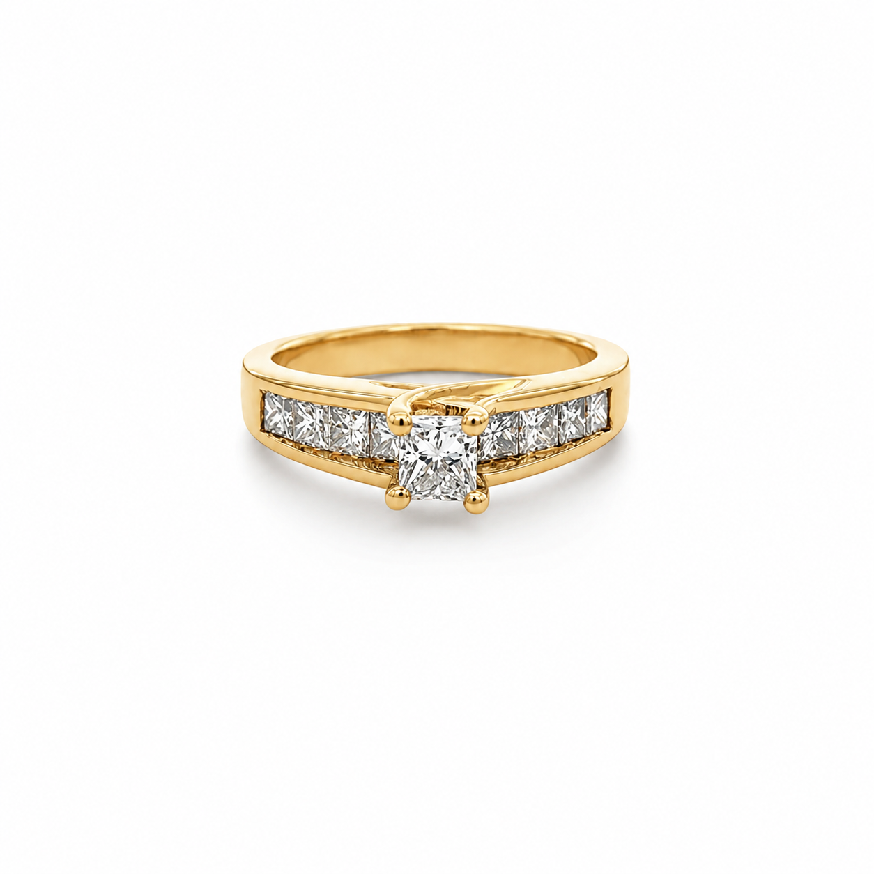 Gold ring with diamonds on a white background