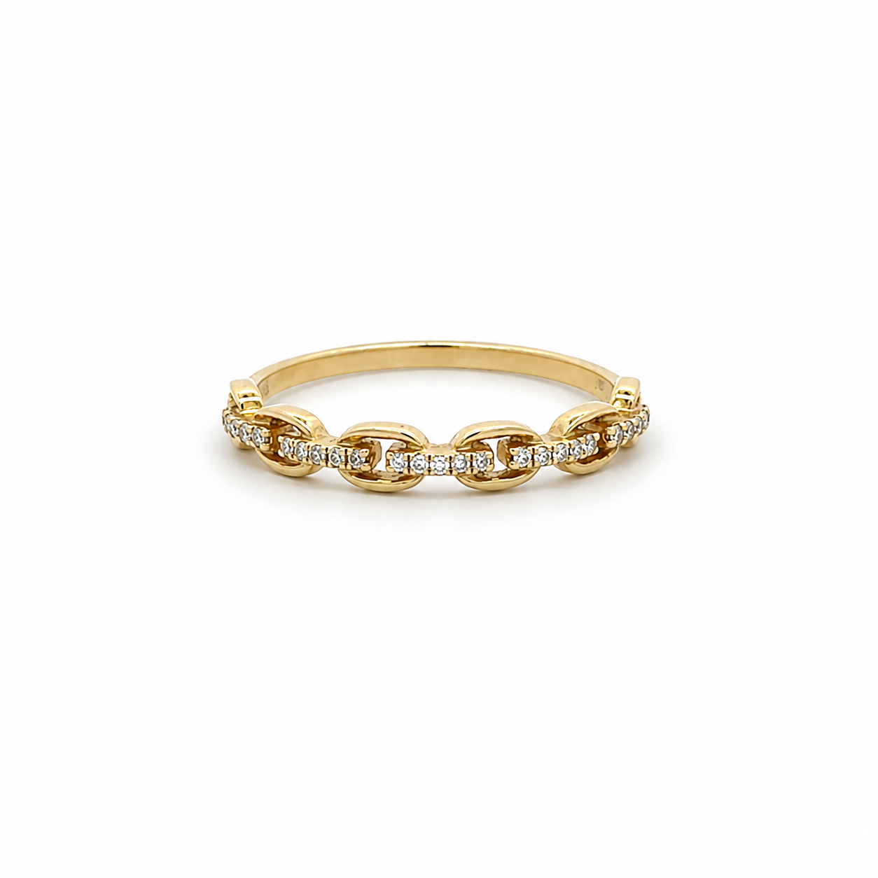 A gold chain-link ring with small clear stones set along the top, photographed on a clean white background.
