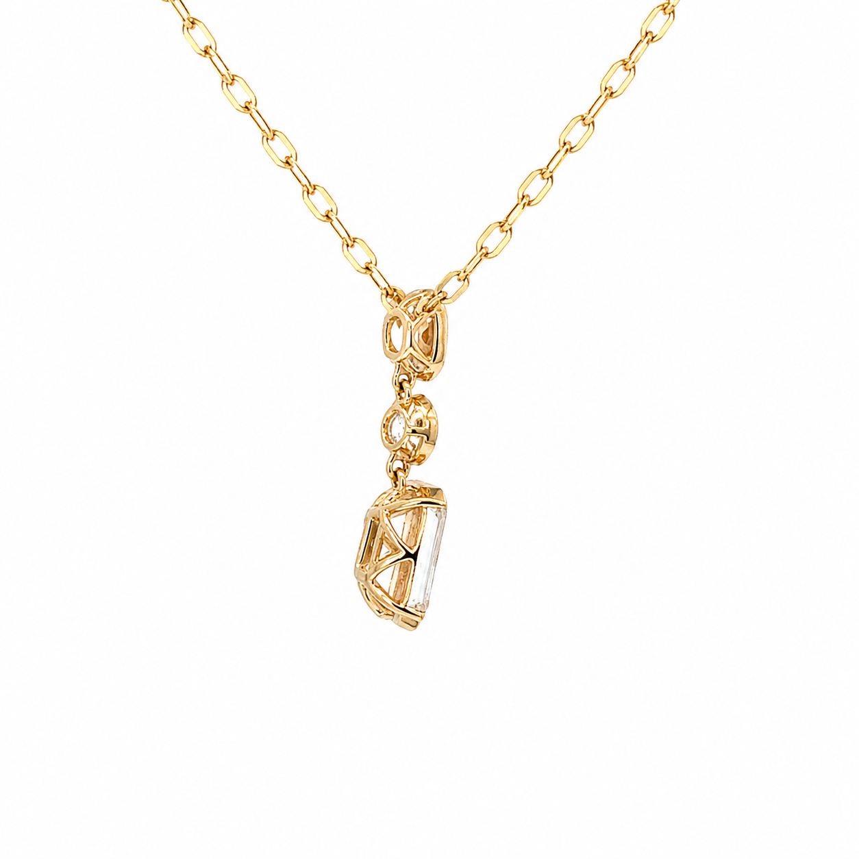 Gold and diamond necklace on a white background 