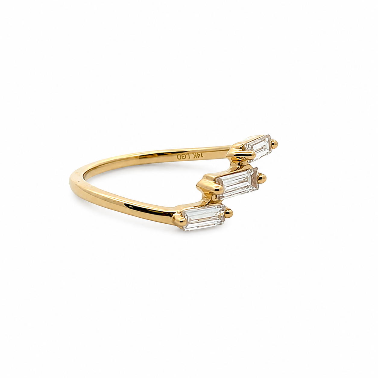 14k Yellow gold ring on a white background 