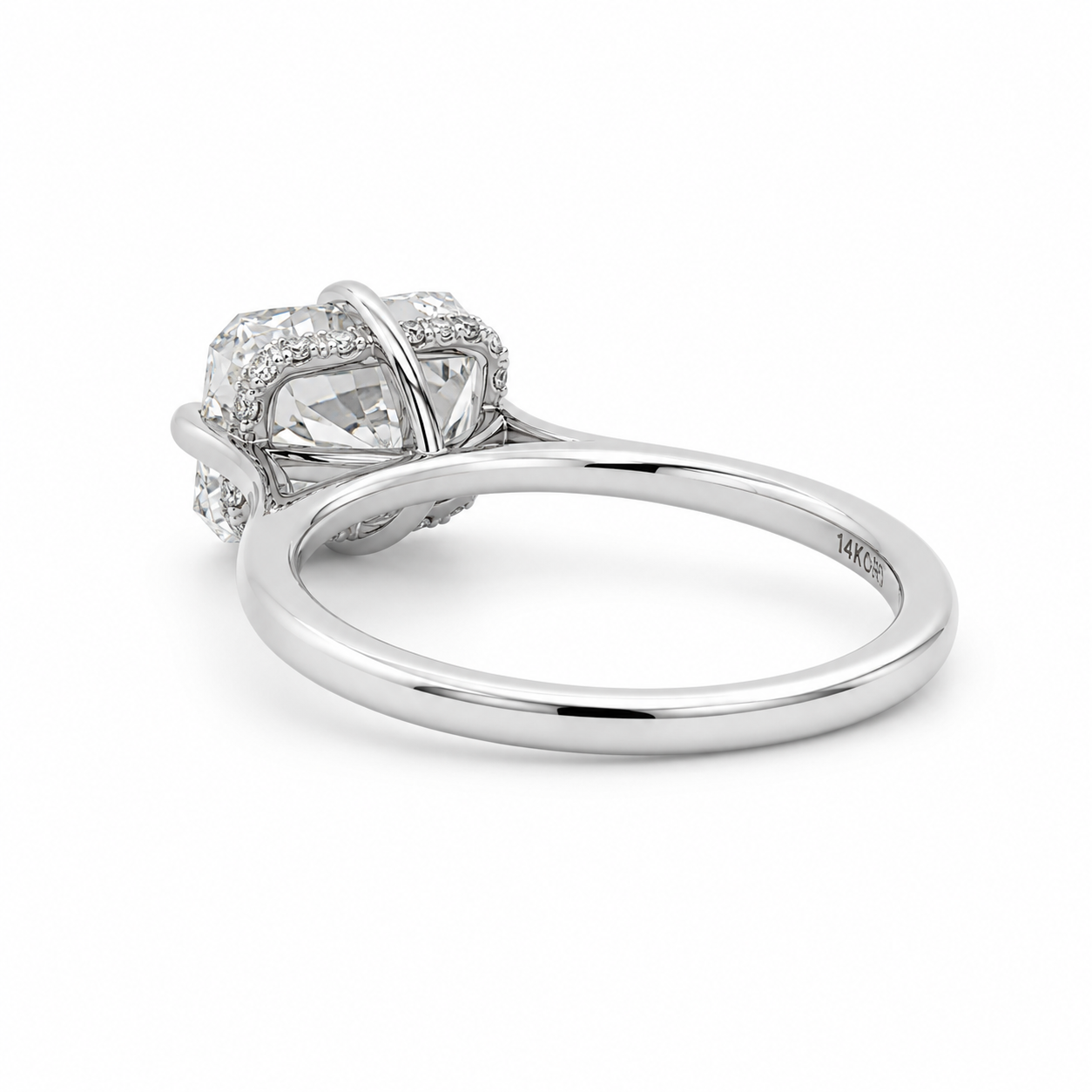 Silver ring with a diamond on a white background