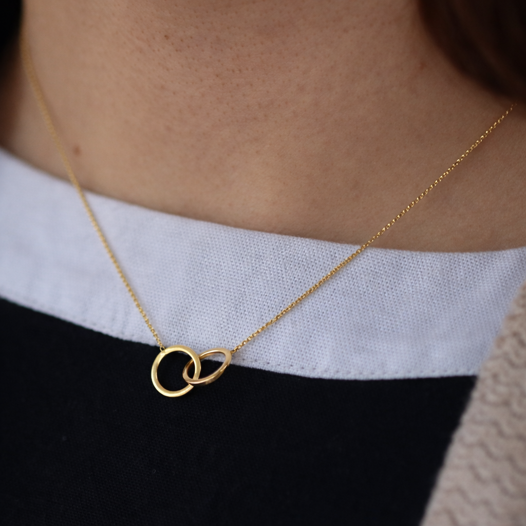 interlocking necklace on model 