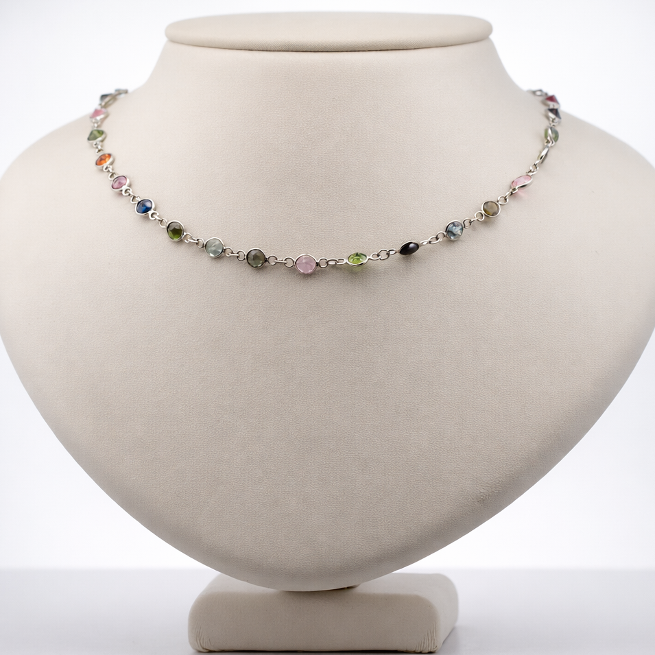 Necklace with multicolored beads on a white mannequin bust