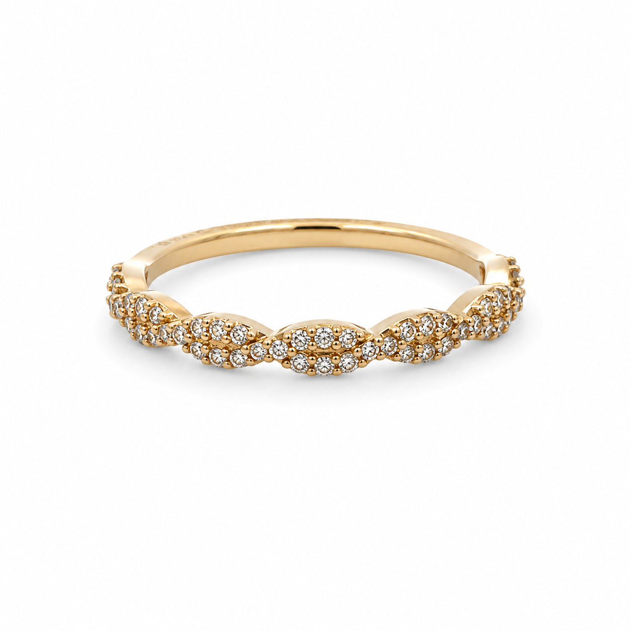 Gold ring with diamond accents on a white background