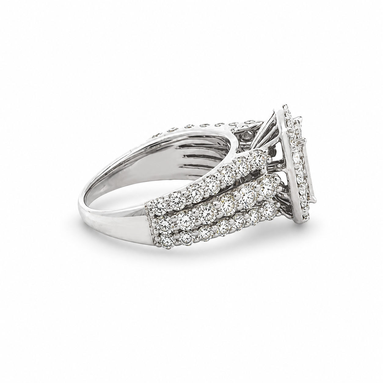 Silver ring with diamond accents on a white background
