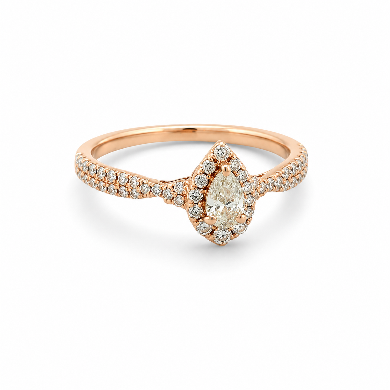 Rose gold ring with a pear-shaped diamond and smaller diamonds on a white background