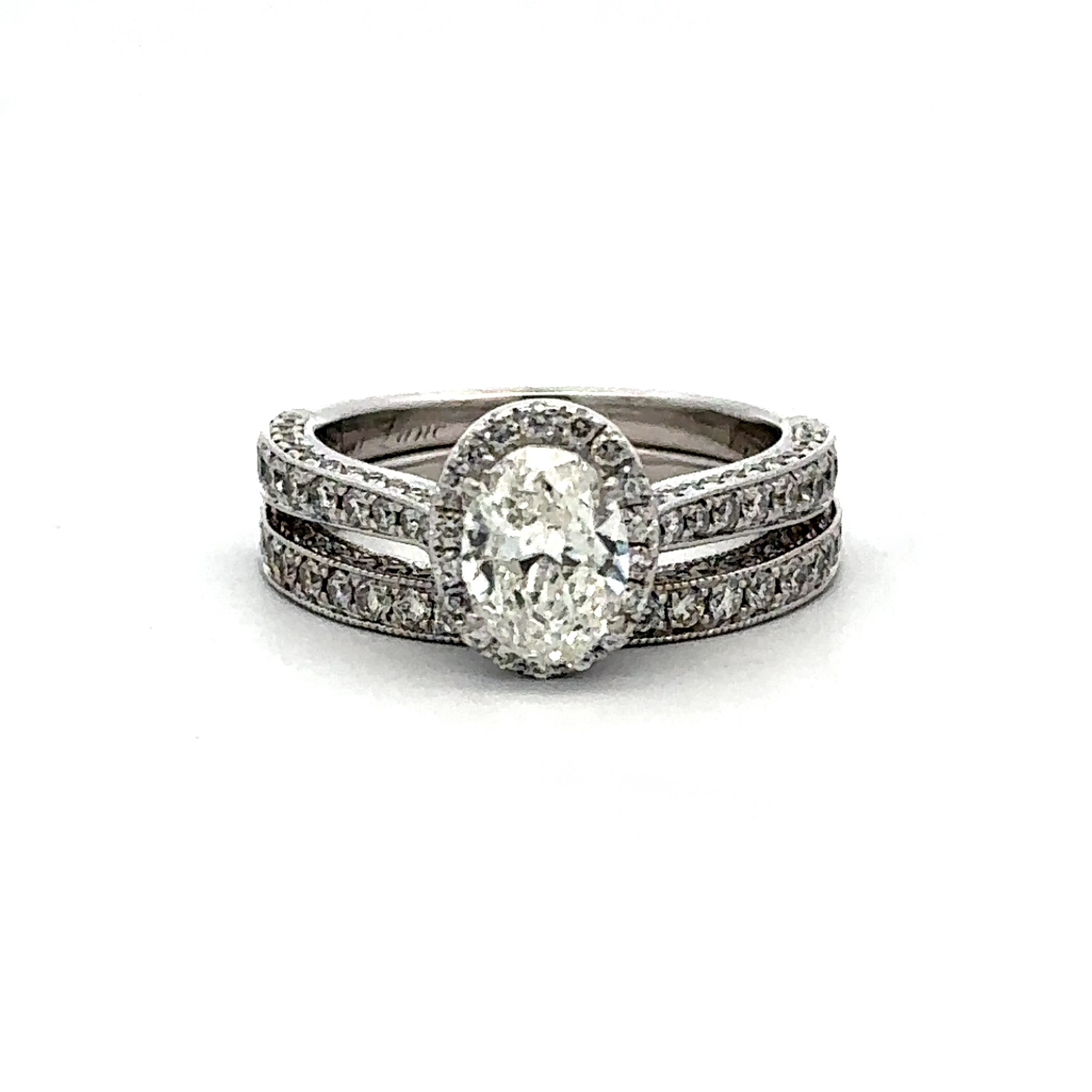 Estate Collection: Neil Lane 14K White Gold Natural Approx. 1.00CT  Oval Center Halo Engagement Ring And Wedding Band Set