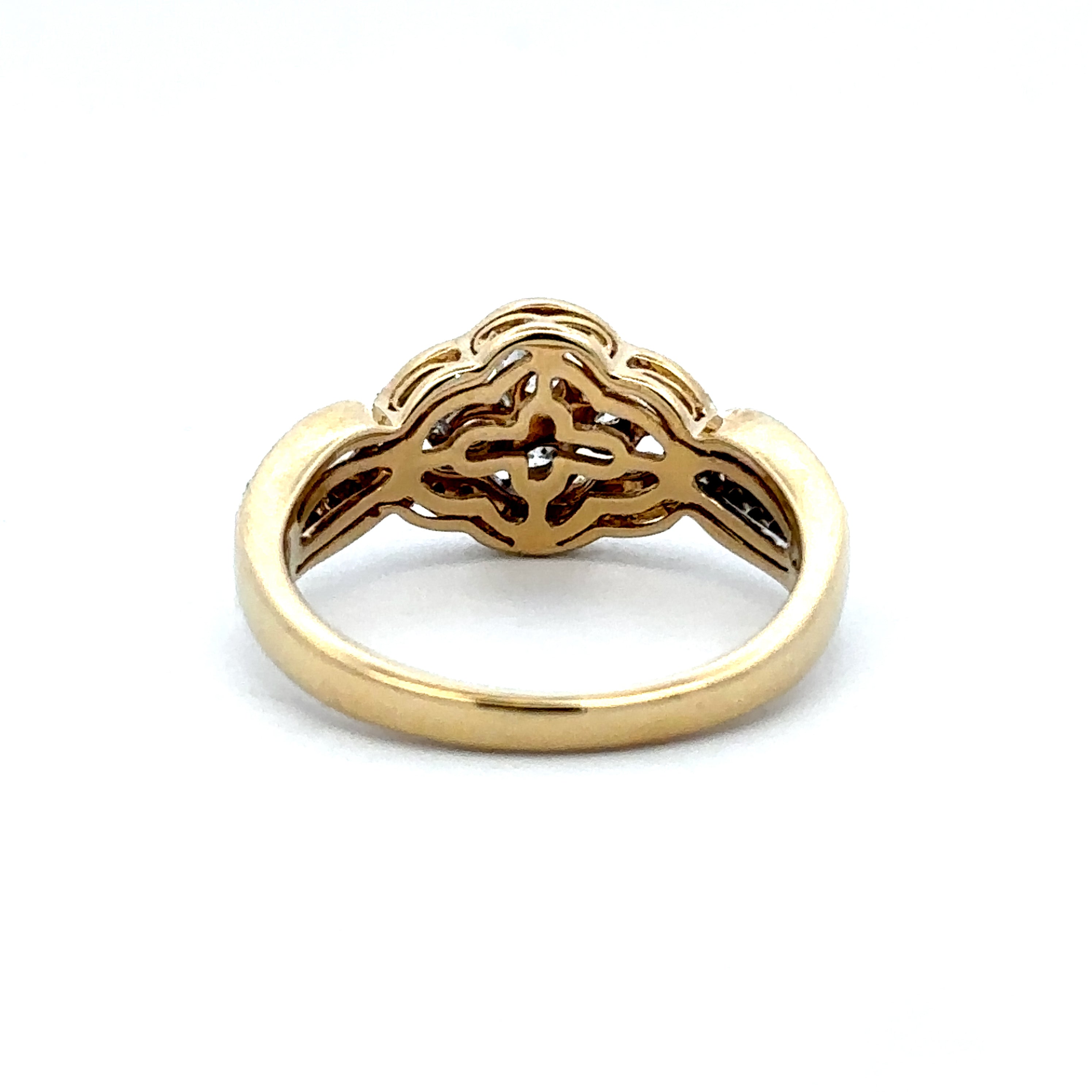 Yellow Gold diamond ring on a white background