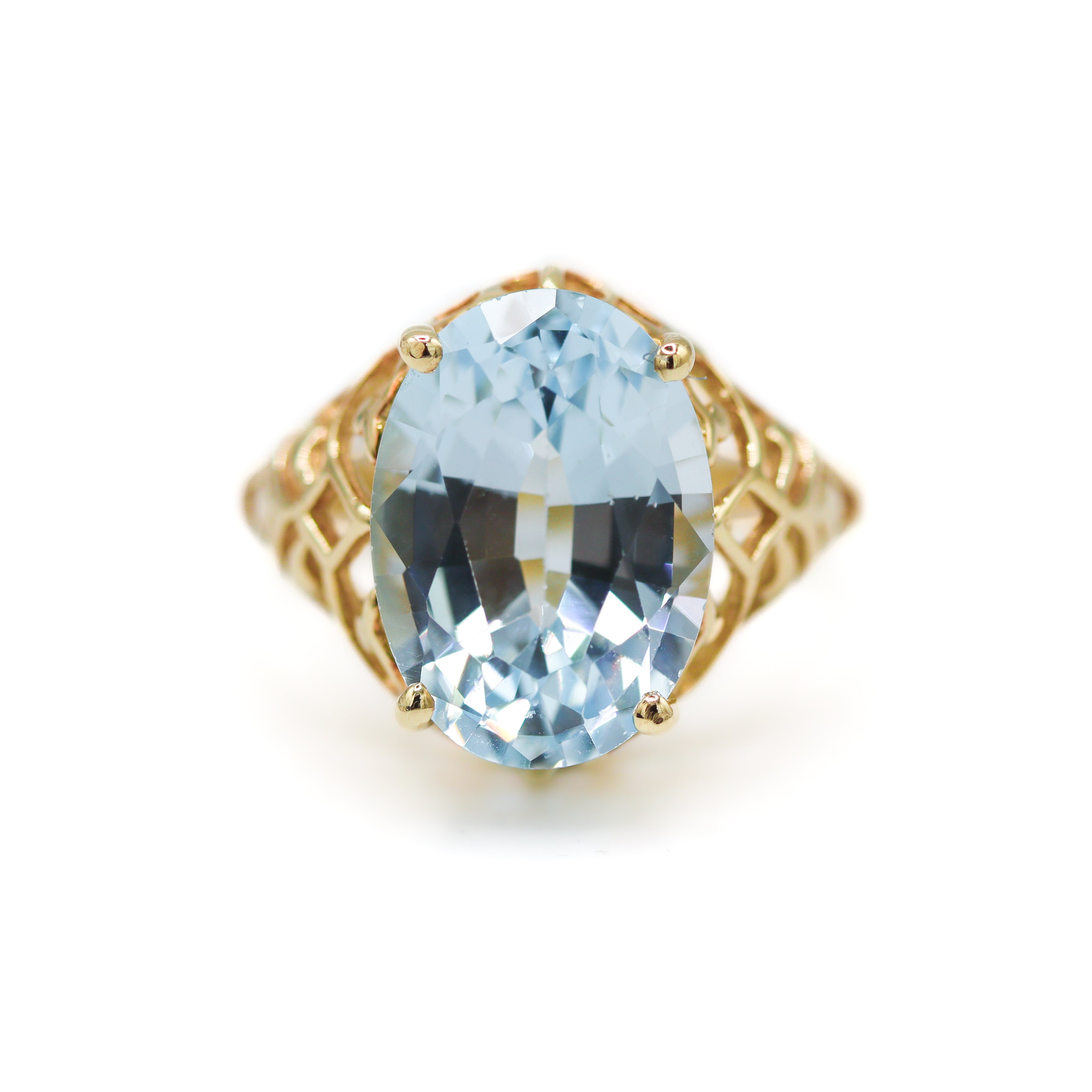 Estate Collection: 10K Yellow Gold Oval-Shaped Blue Topaz Vintage Floral Ring
