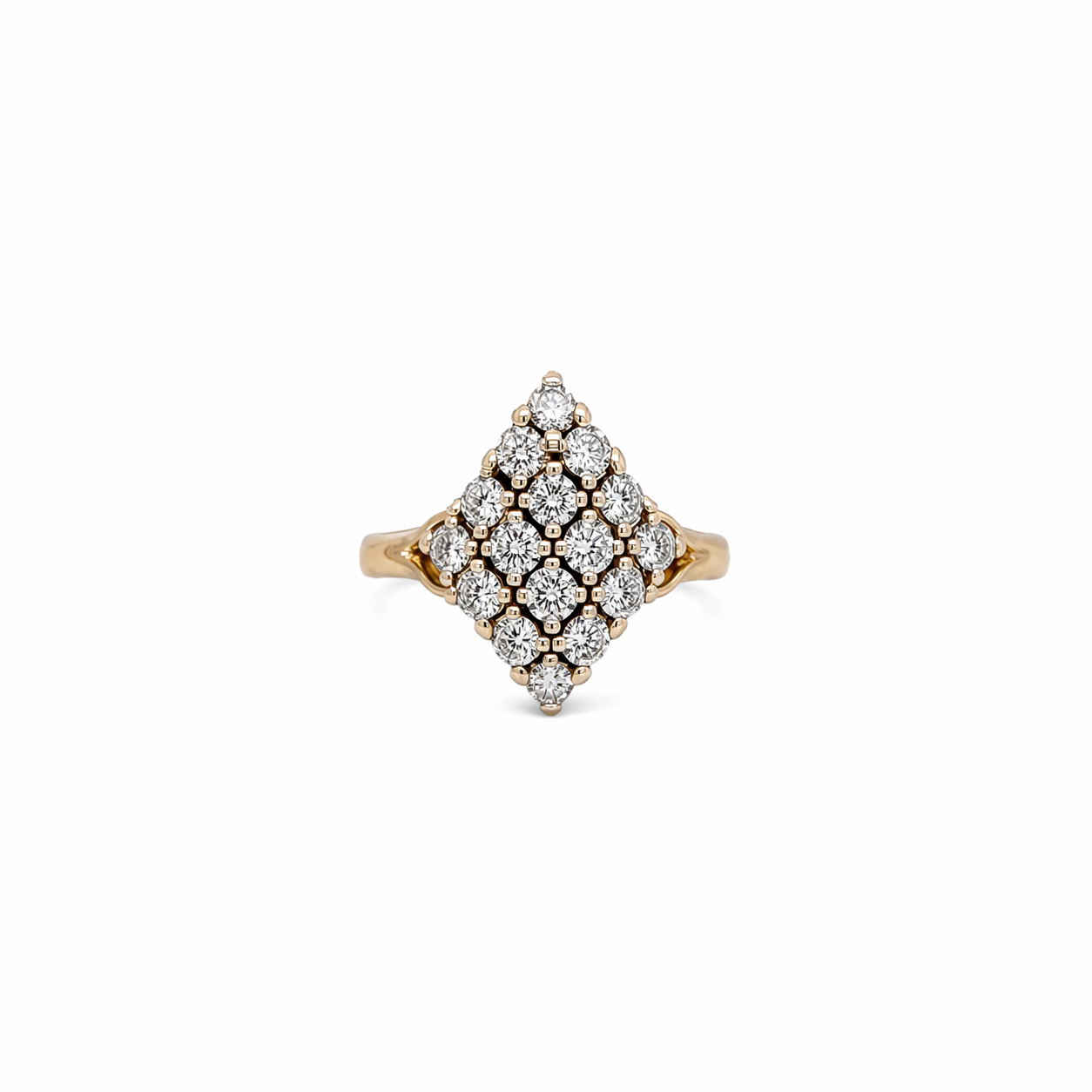 Gold ring with diamond-shaped design on a white background