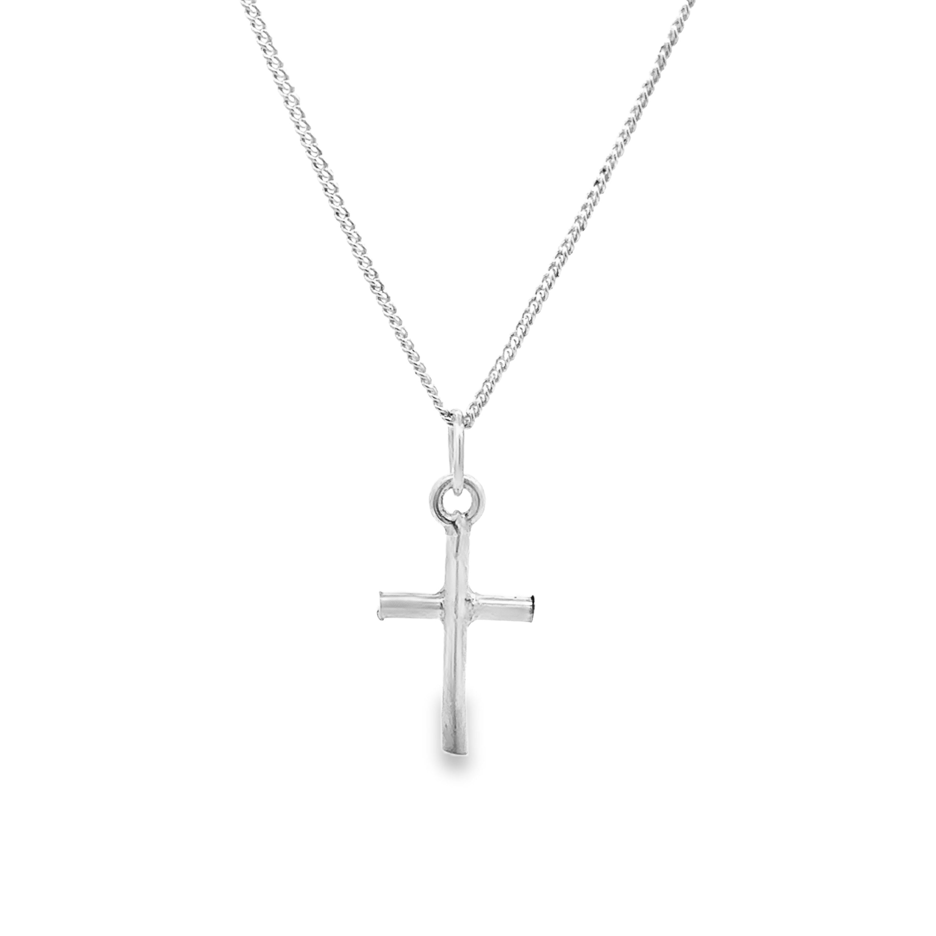 A silver cross pendant necklace on a delicate silver chain, shown against a plain white background.