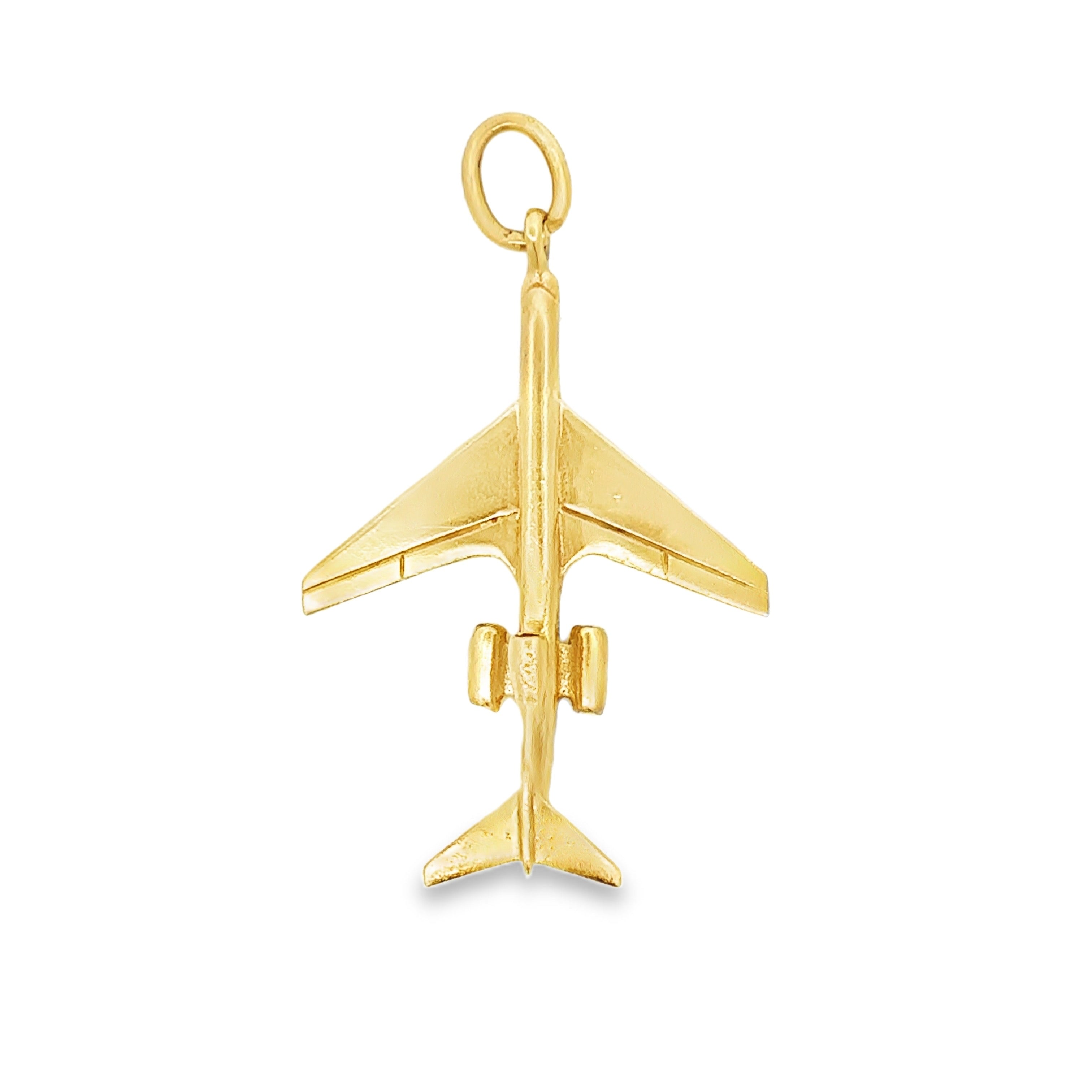 A polished yellow gold airplane charm pendant, shown from a top-down perspective on a clean white background.