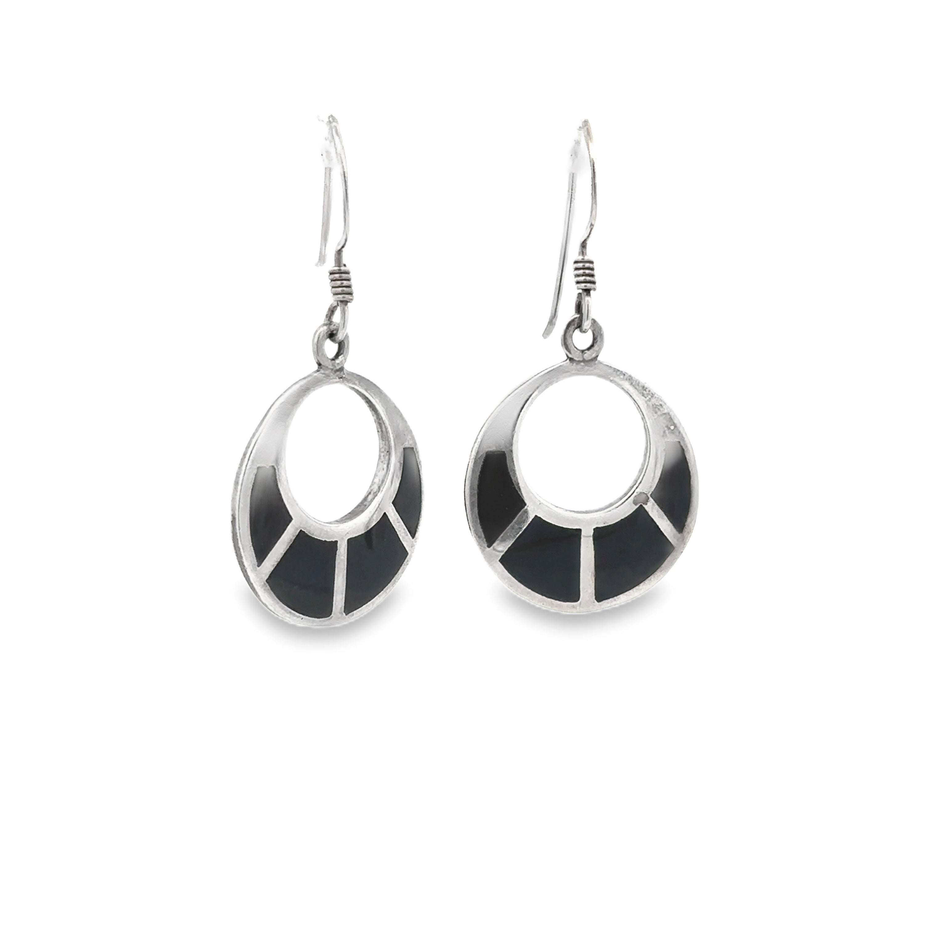 A pair of silver-toned drop earrings with open circular designs and black inlay segments, shown on a plain white background.