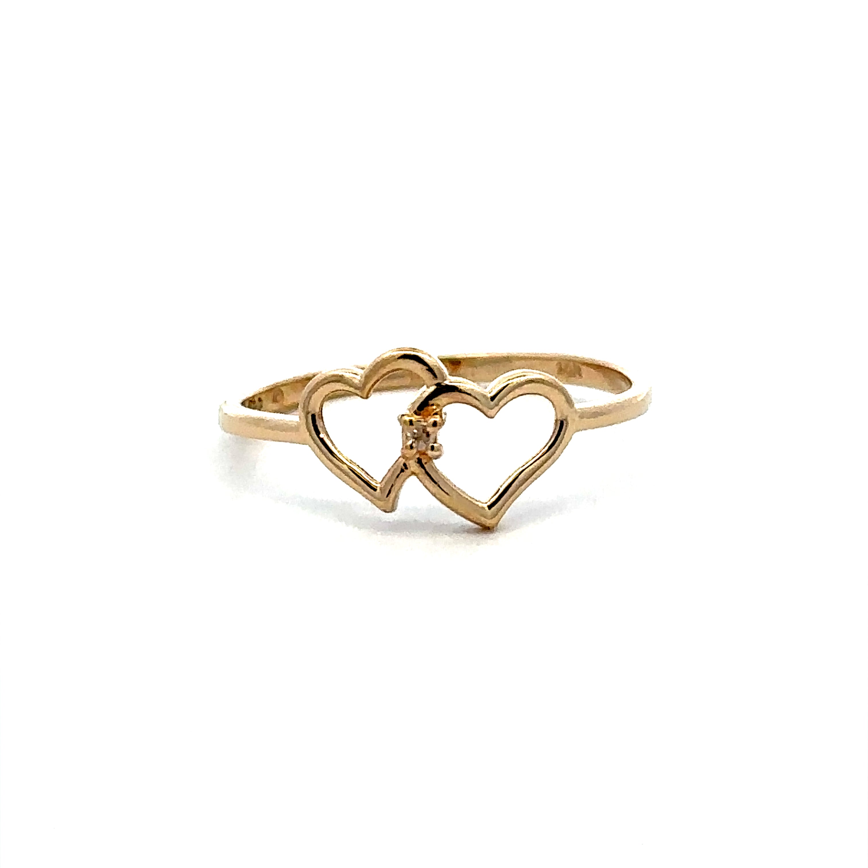 10K Gold heart ring on a white background 