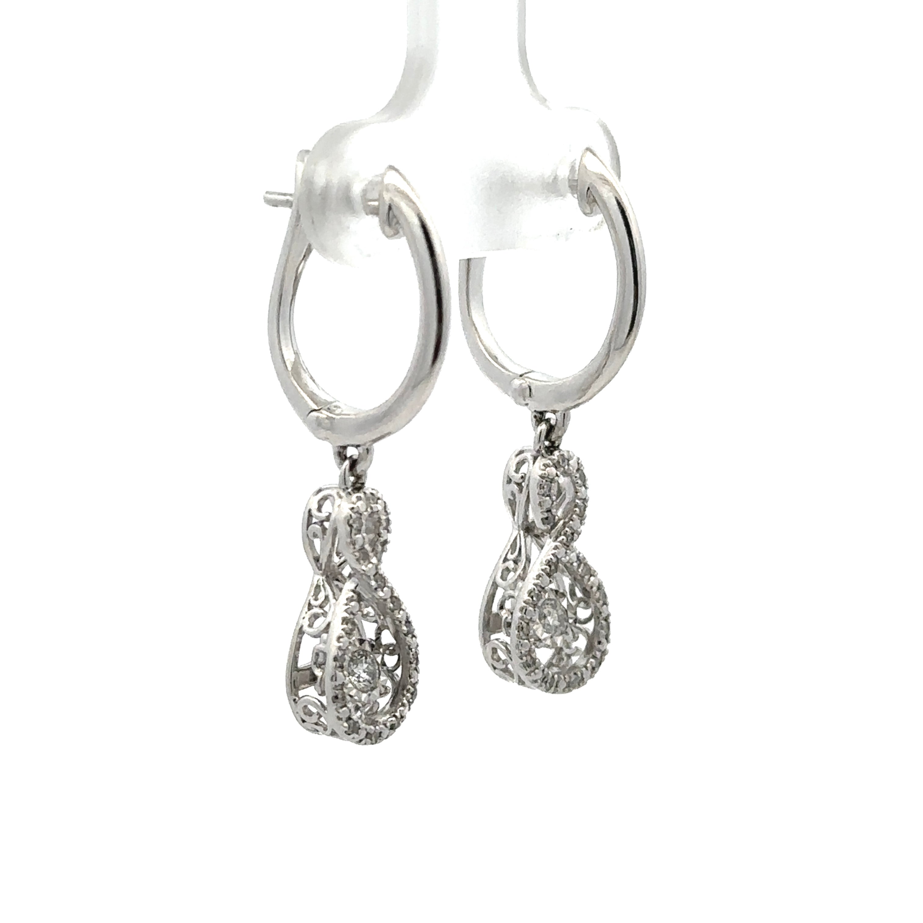 Estate Collection: 10K White Gold Infinity Dancing Diamond Dangle Earrings