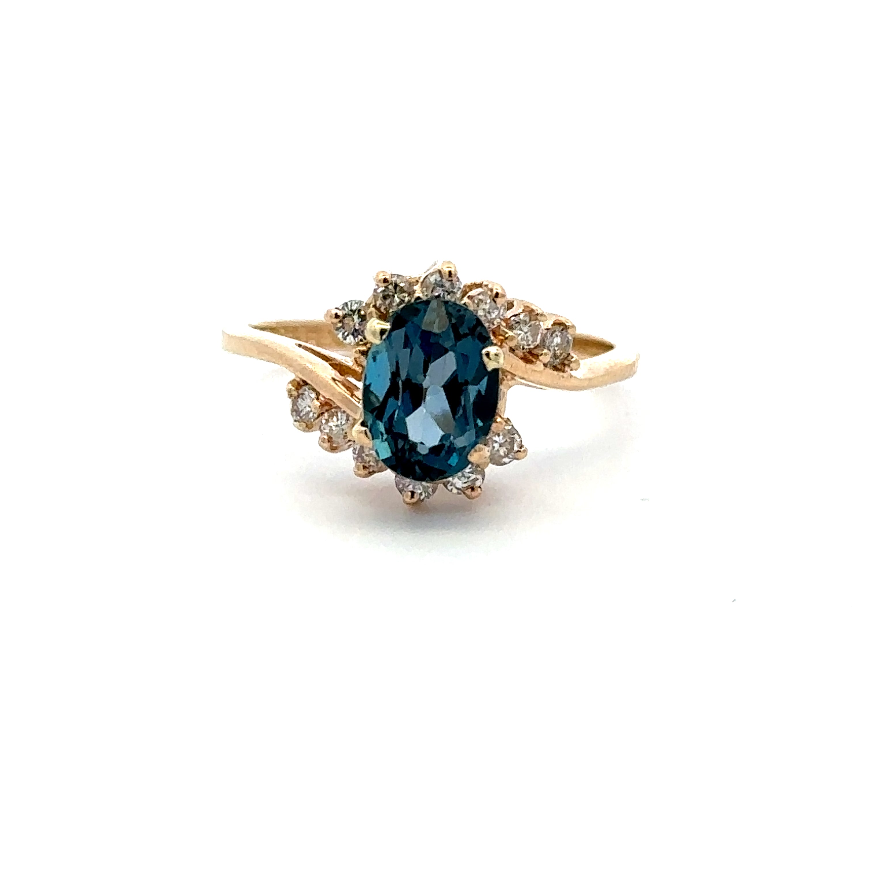 Estate Collection: 14K Yellow Gold London Blue Topaz and .25CT. Natural Diamond Accented Cocktail Ring