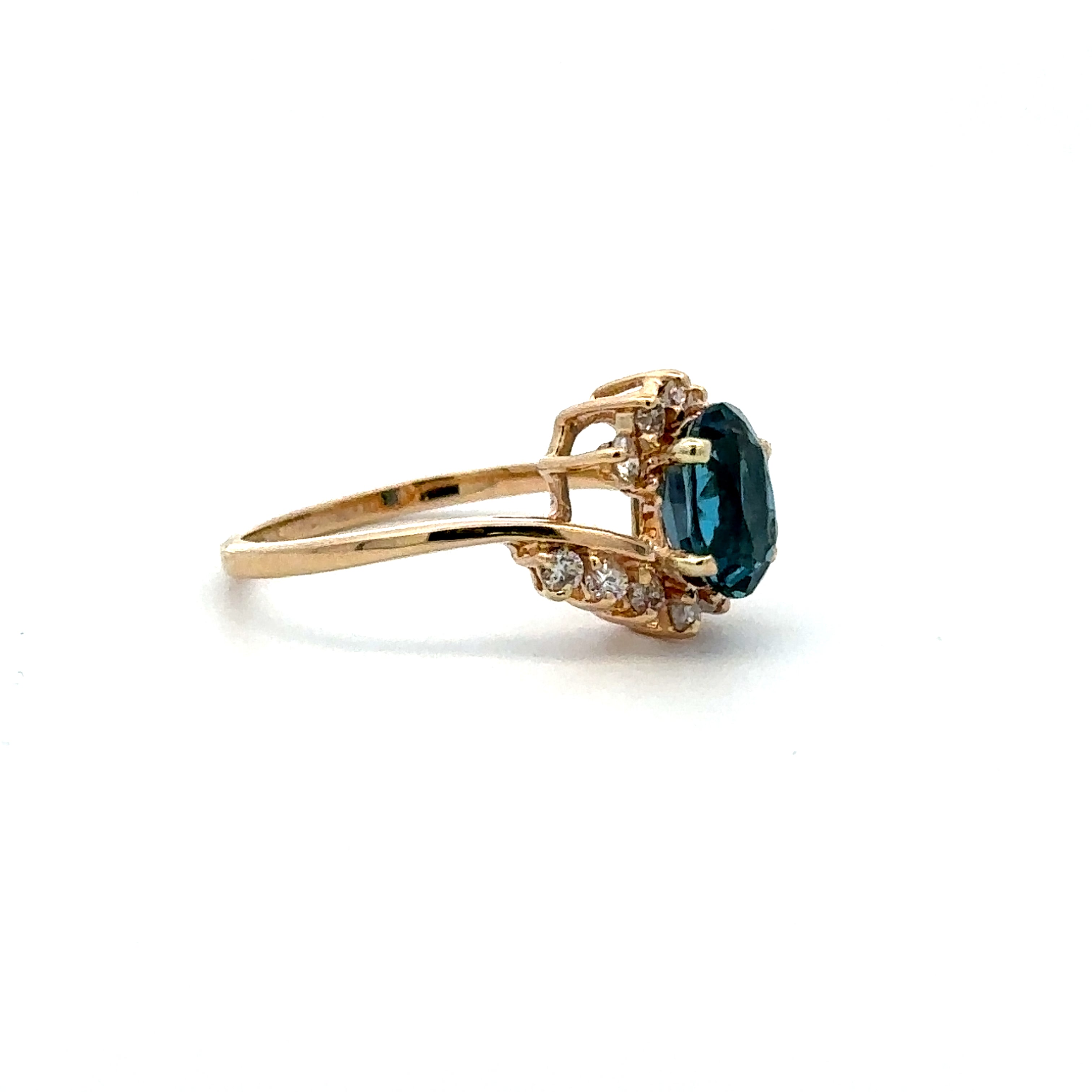 Estate Collection: 14K Yellow Gold London Blue Topaz and .25CT. Natural Diamond Accented Cocktail Ring