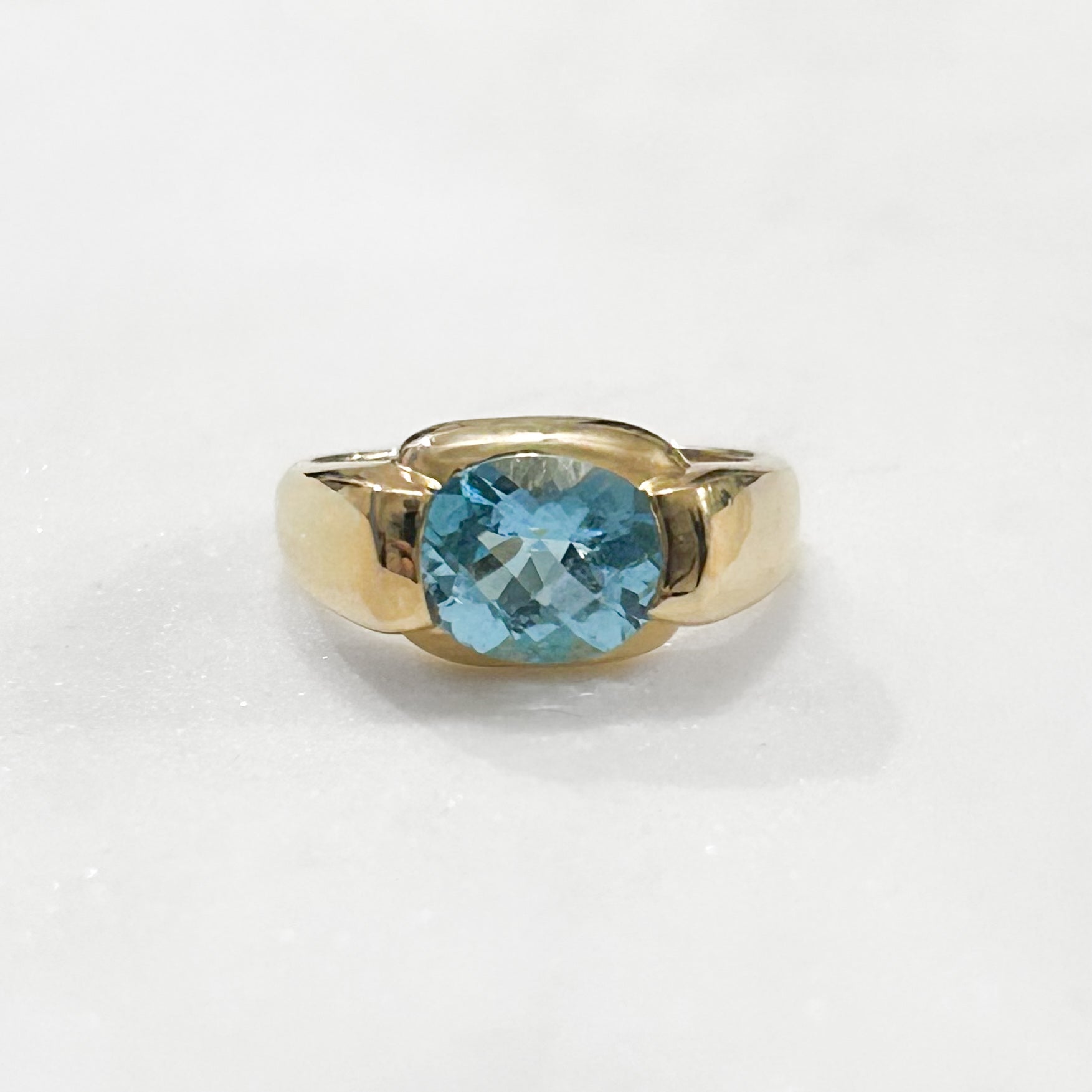 Estate Collection: 14K Yellow Gold East-to-West Blue Topaz Half-Bezel Fashion Ring