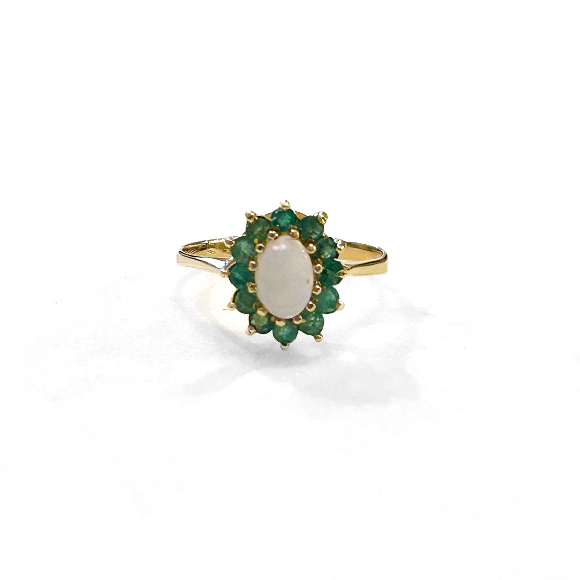 Estate Collection: 10K Yellow Gold Oval Opal & Emerald Halo Ring