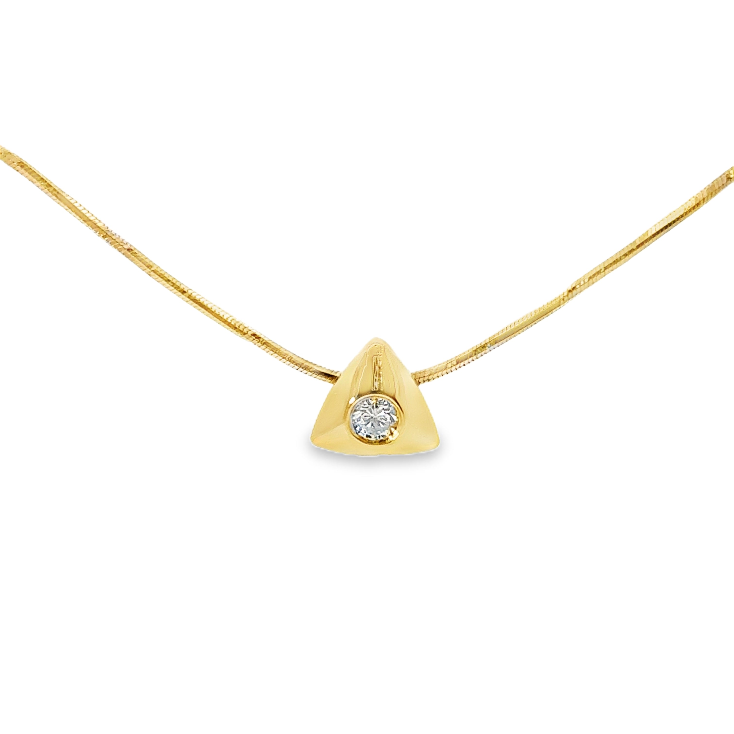 Gold necklace with a triangular pendant featuring a diamond on a white background