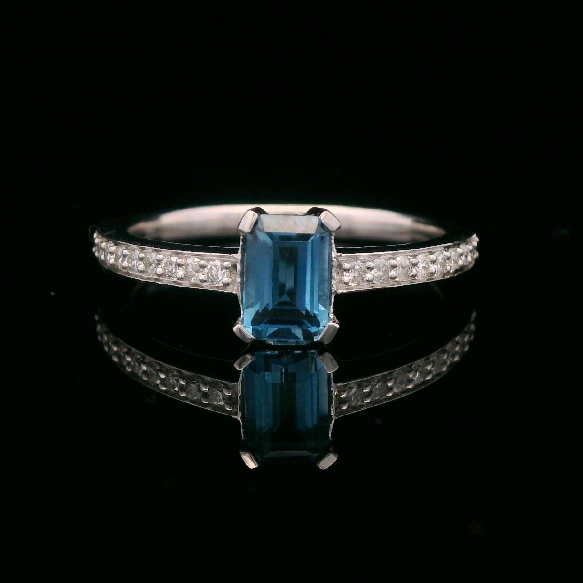 10k White Gold 1/6 CTW Diamond 3/4 CT London Blue Topaz Ring