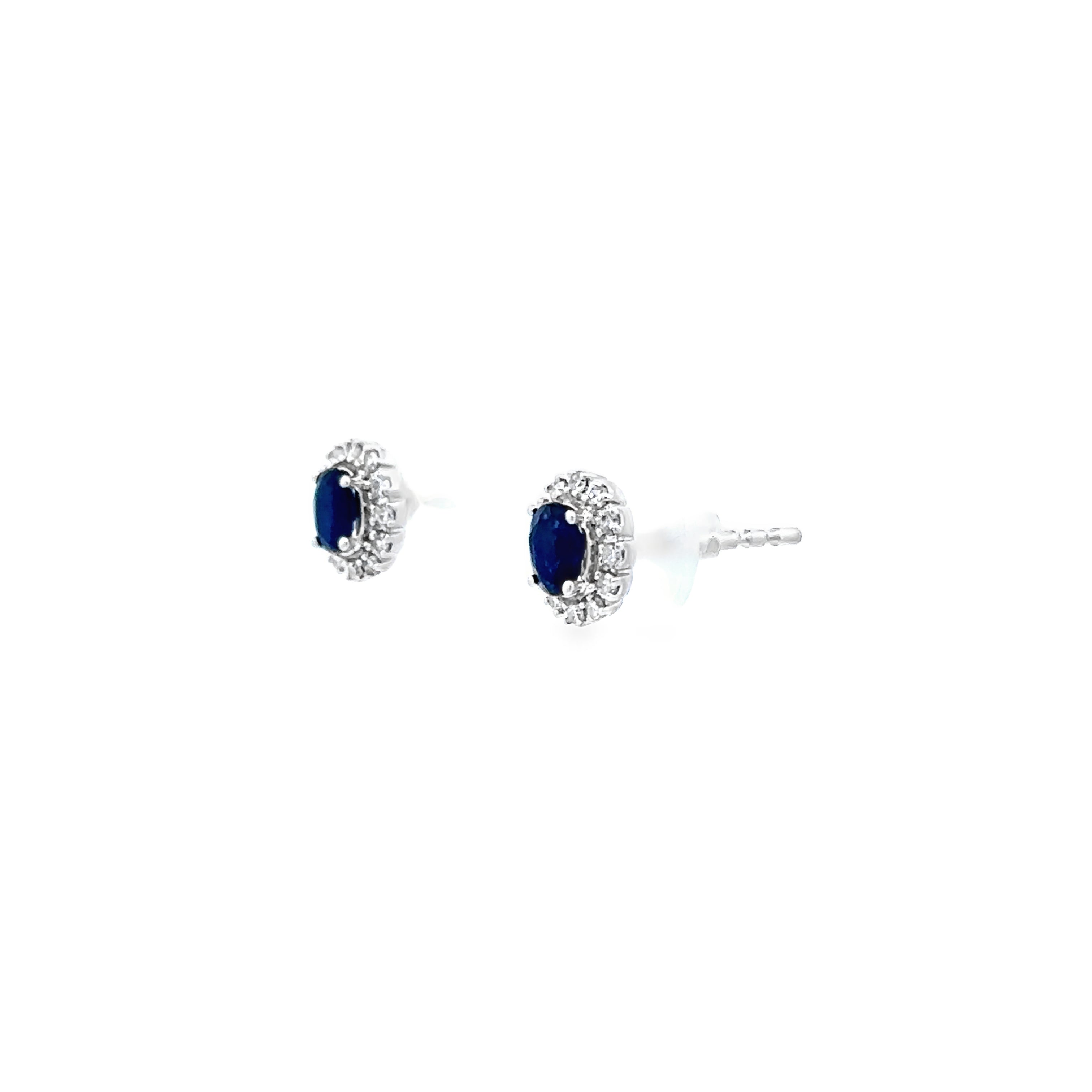 Close up of sapphire and diamond studs