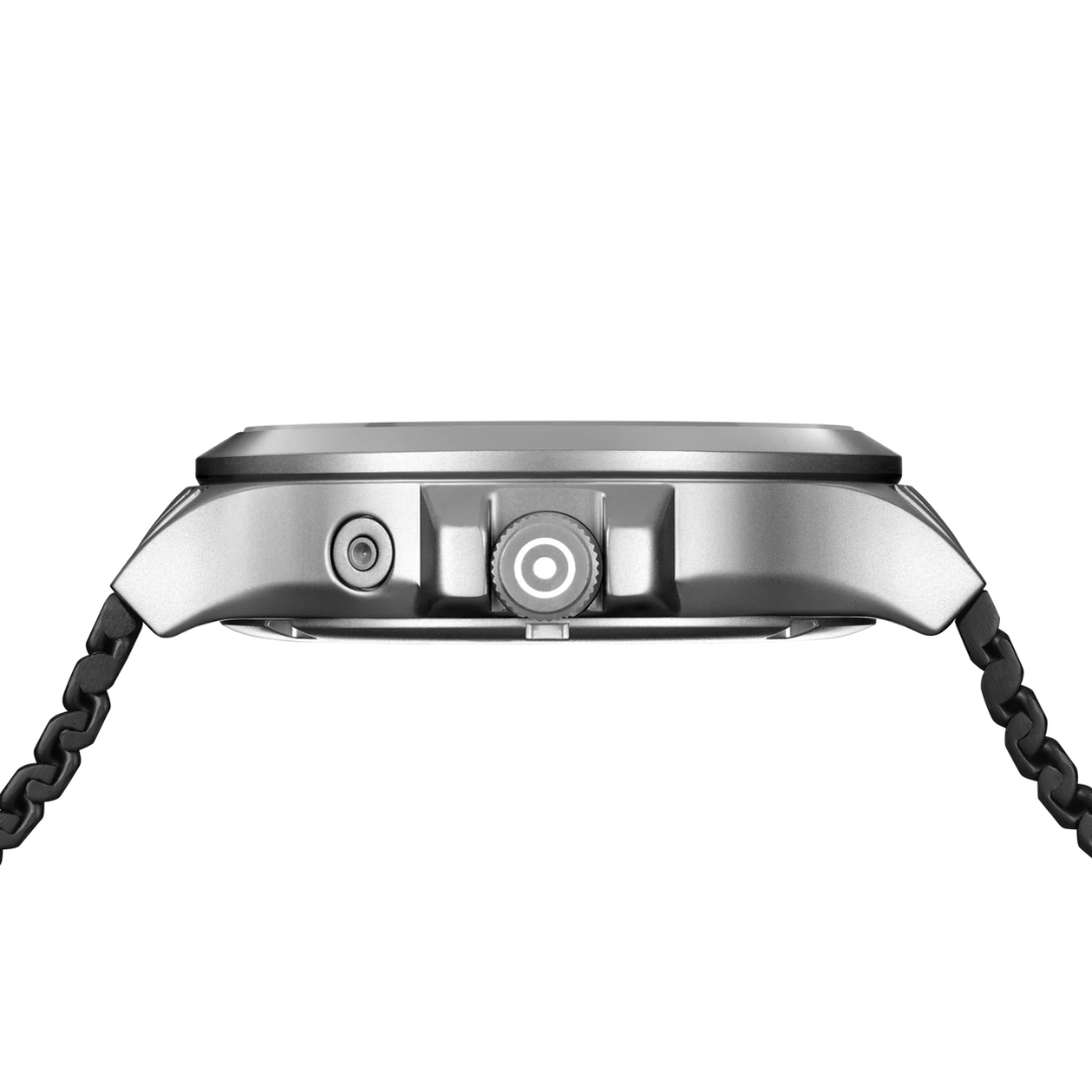 Side picture showing the dial of GLOCK Silver Tone Stainless Steel Solar Watch With Black Silicone Band on a tranparent background