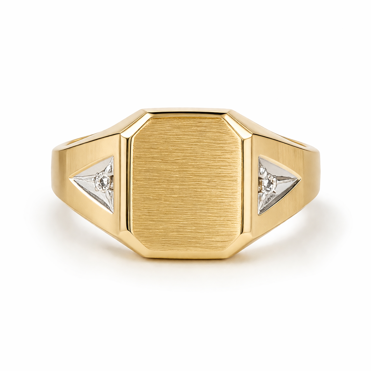 Gold ring with diamond accents on a white background