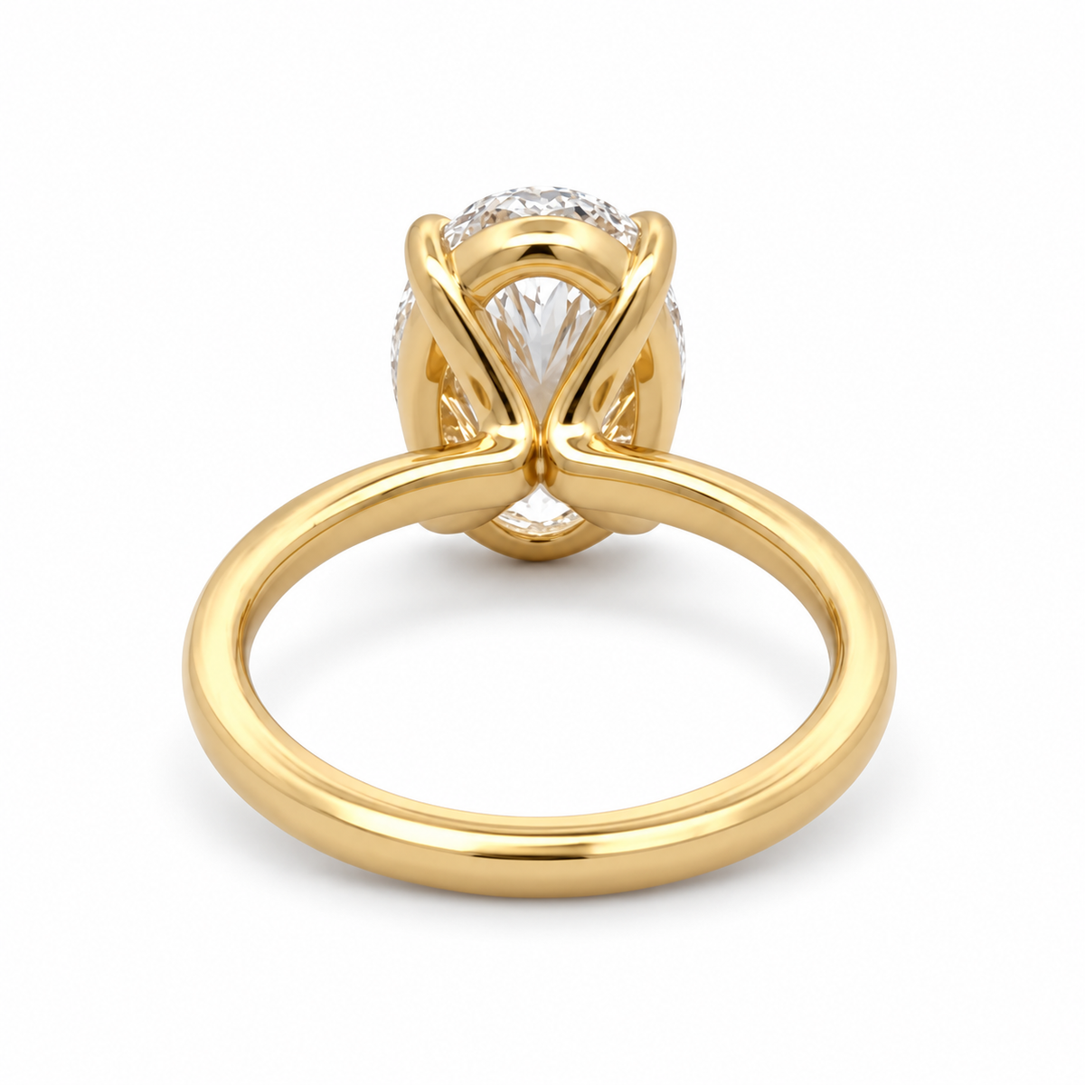 Rear view of the Mia 14K yellow gold solitaire ring, showing the open gallery beneath the 5.02CT. oval lab-grown diamond.