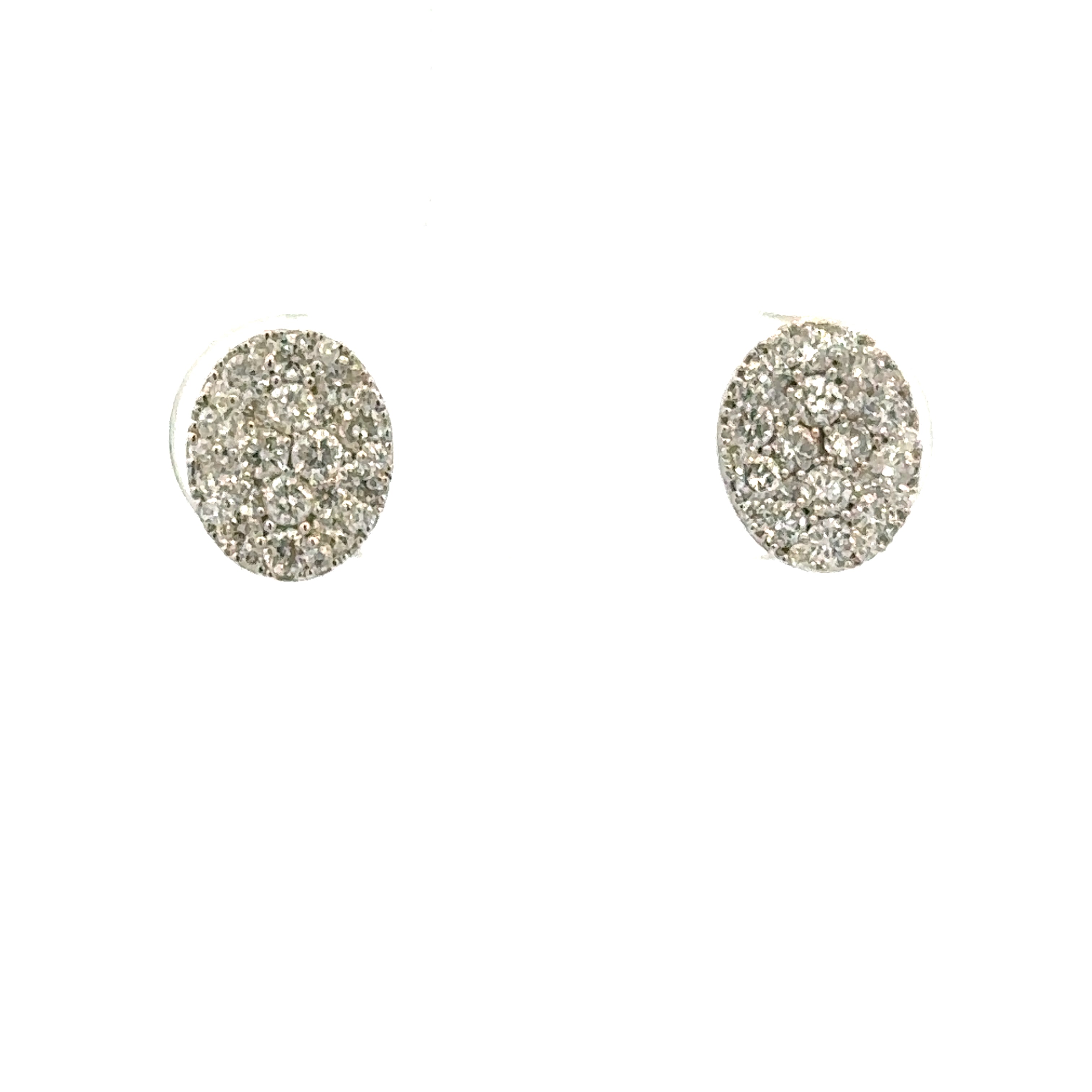 A pair of oval-shaped pavé stud earrings with a silver-toned setting and clear stones, displayed on a solid white background.