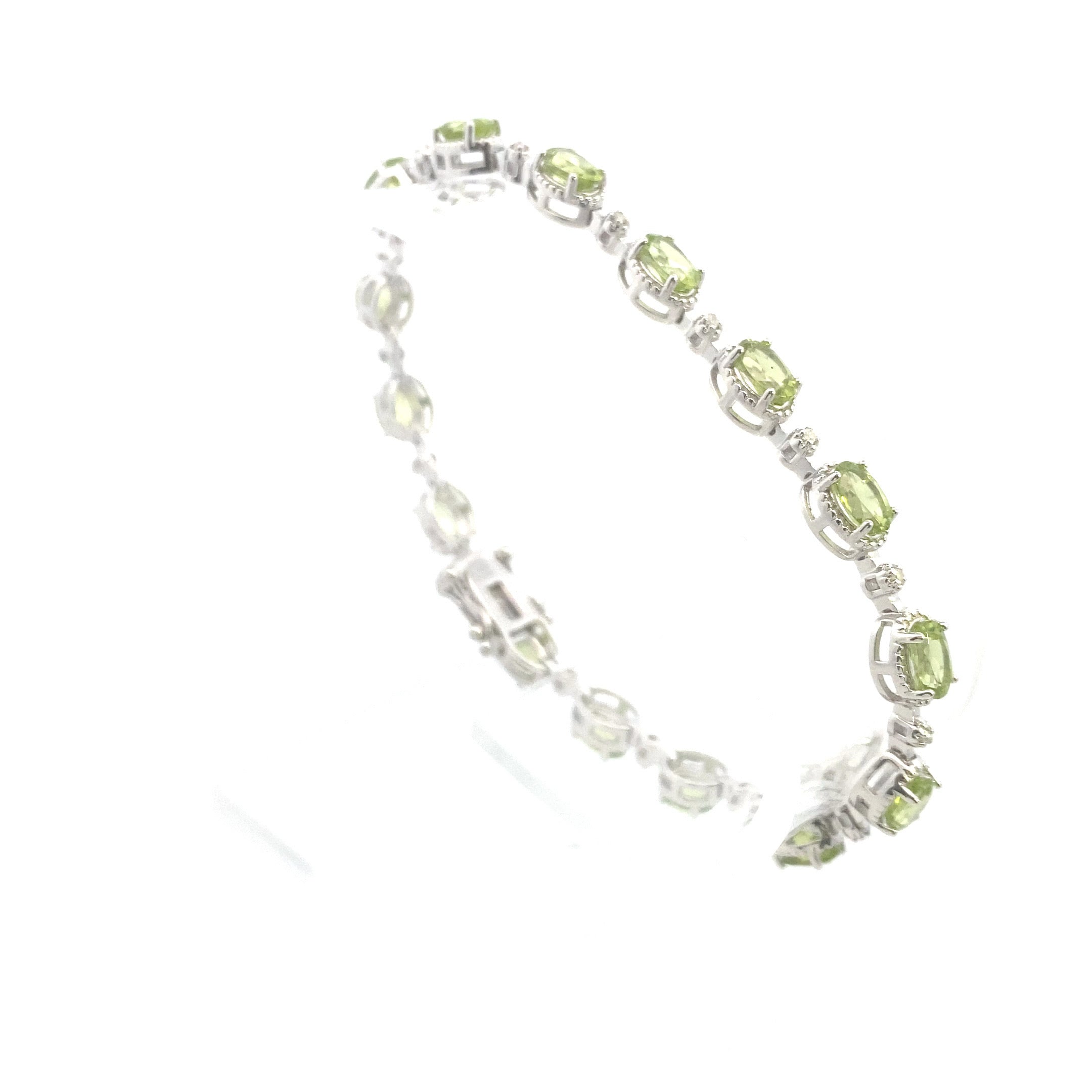 Sterling Silver 7-1/6CT. Oval-Cut Peridot & Diamond Accent Tennis Bracelet