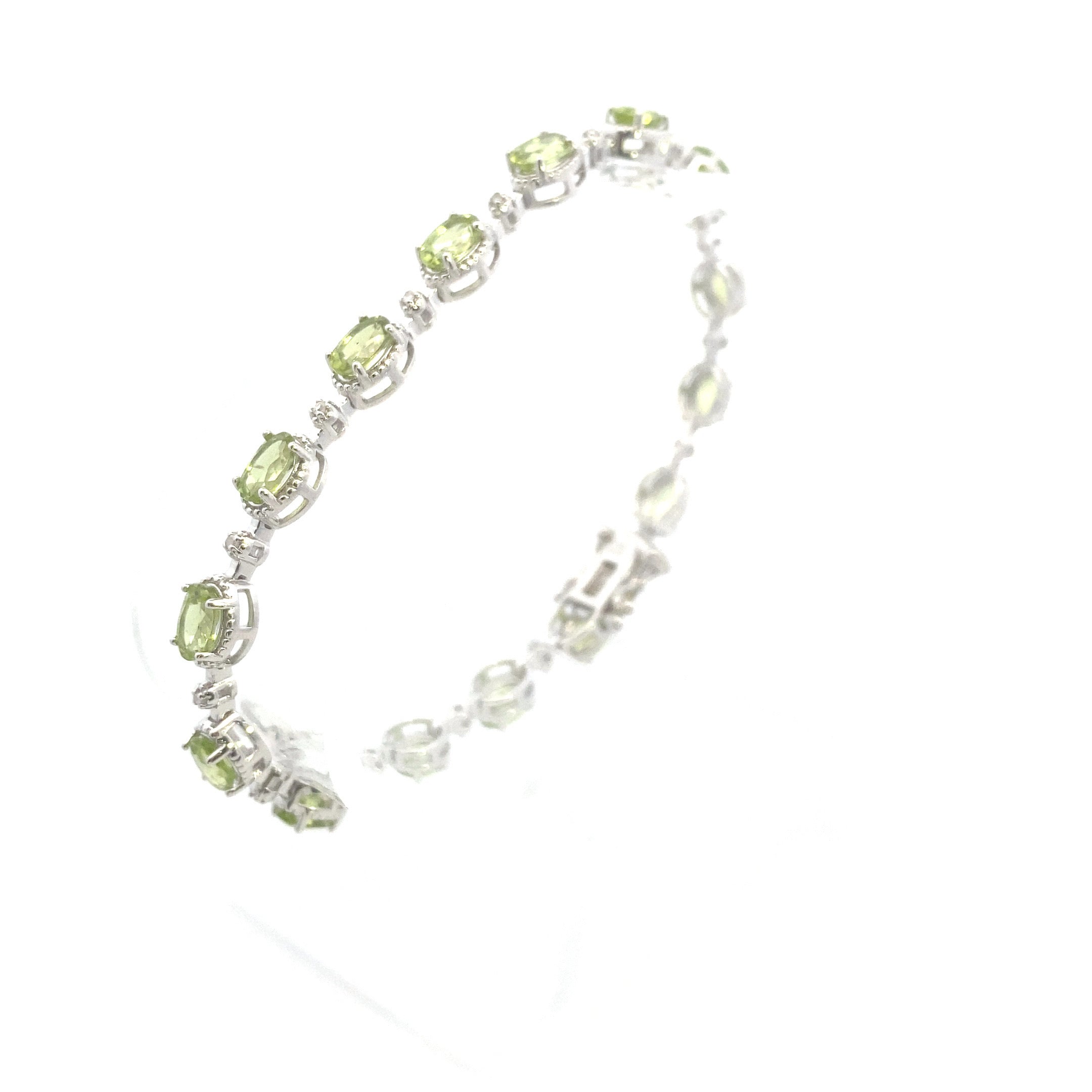 Sterling Silver 7-1/6CT. Oval-Cut Peridot & Diamond Accent Tennis Bracelet