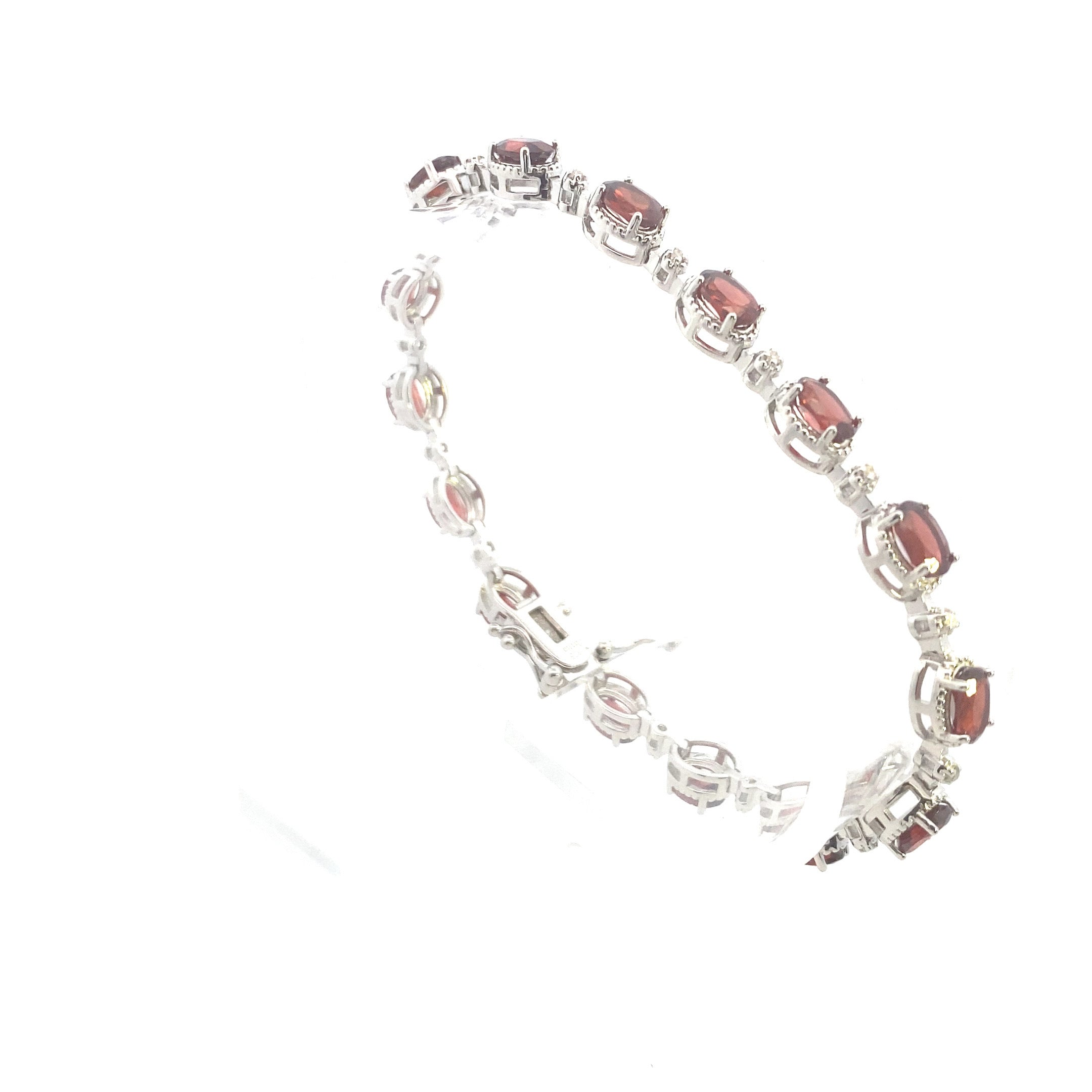 Sterling Silver 7-1/6CT. Oval-Cut Garnet & Diamond Accented Tennis Bracelet