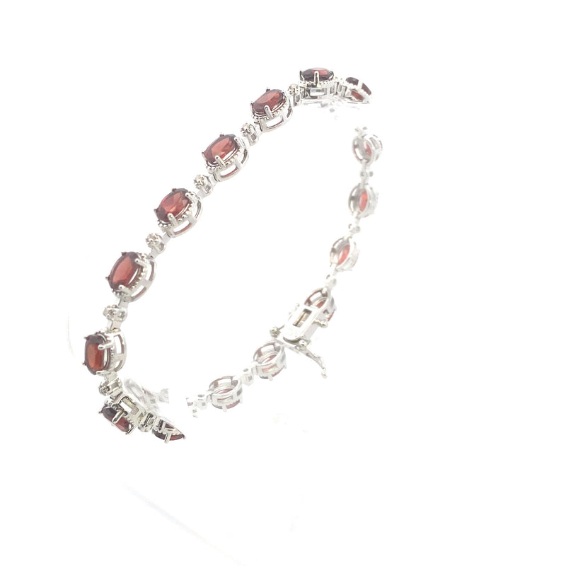 Sterling Silver 7-1/6CT. Oval-Cut Garnet & Diamond Accented Tennis Bracelet