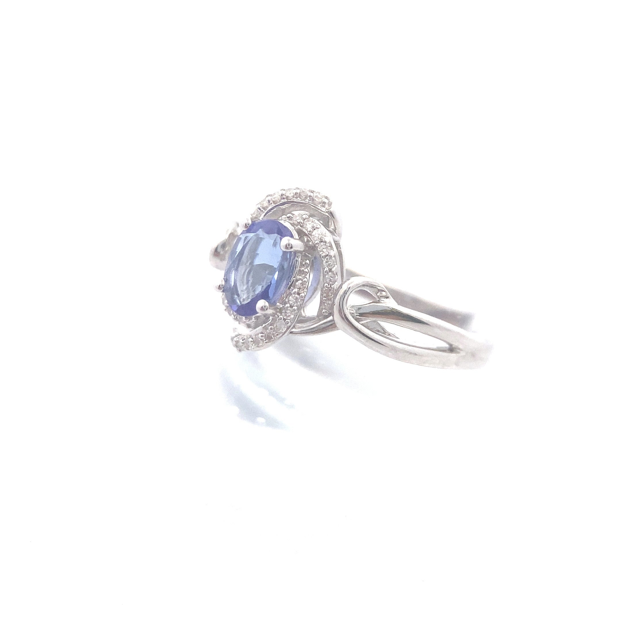 Sterling Silver 3/4CT. Oval-Cut Tanzanite with 1/10CT. White Zircon & Diamond Vortex Halo Ring