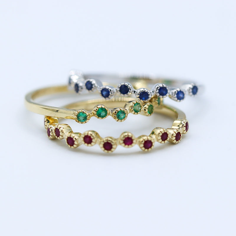 10K Yellow Gold Offset Round Emeralds Station Stackable Ring