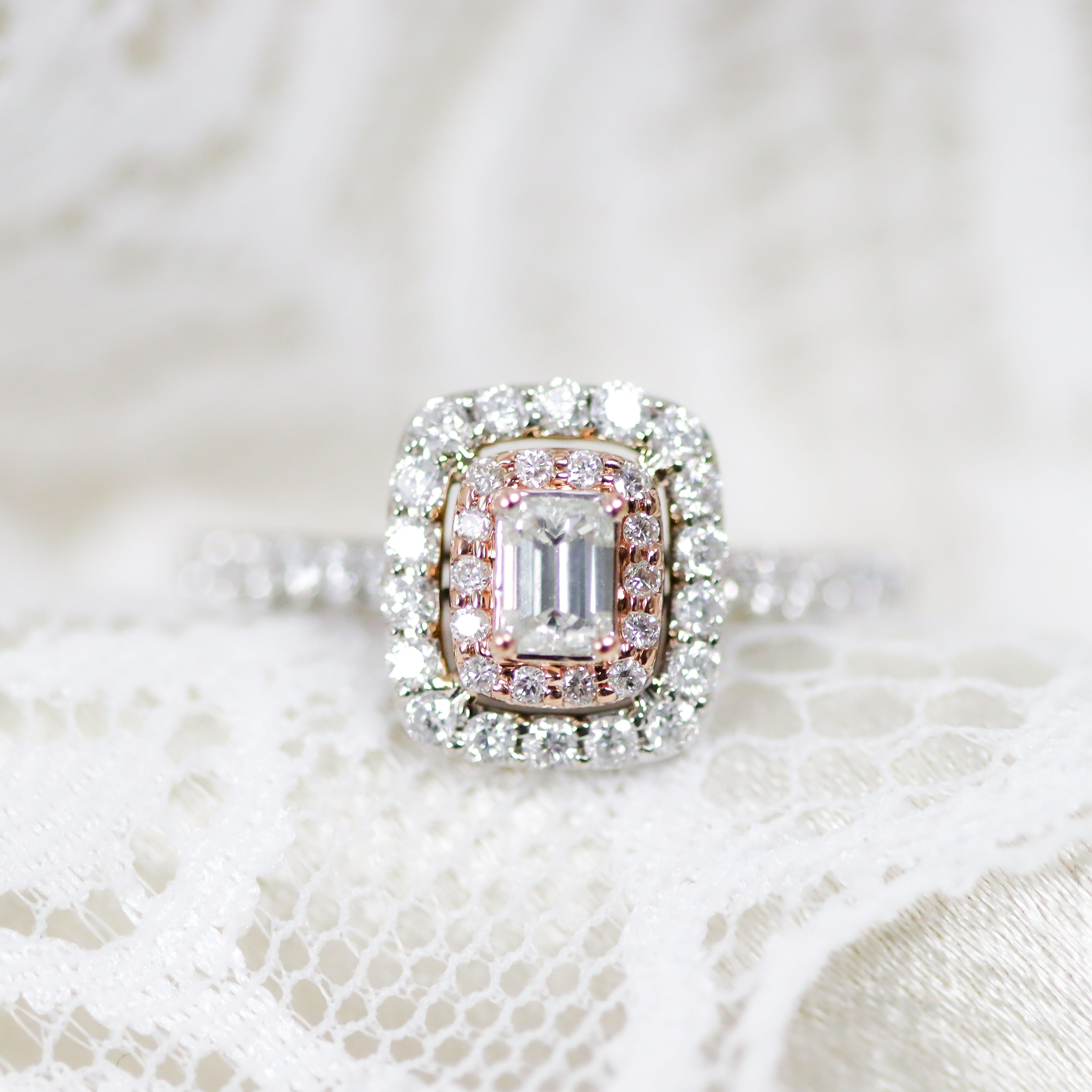 Estate Collection: 14K White Gold Emerald-Cut Diamond Stepped Double Halo Rose Gold Accented Engagement Ring