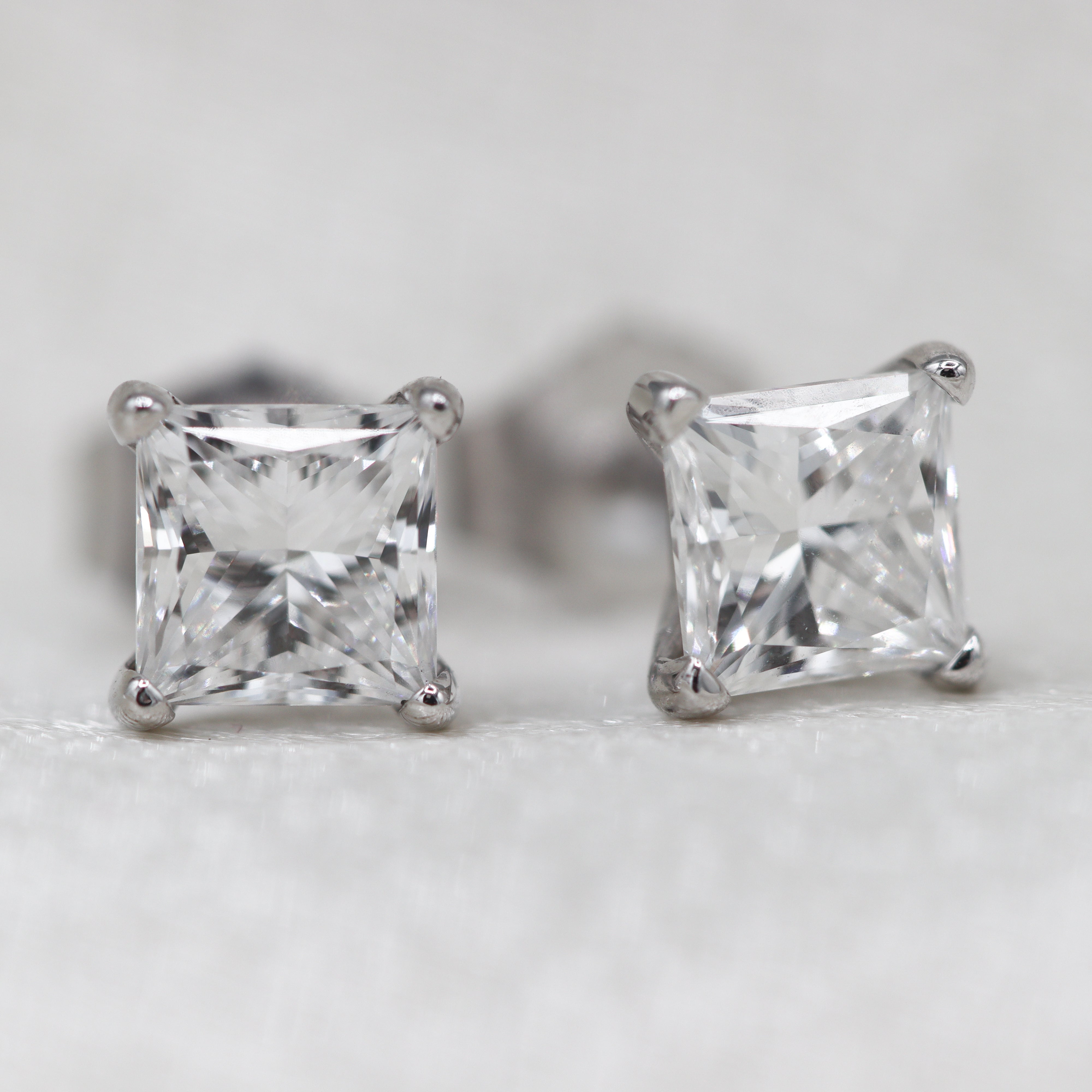 Image of Princess-Cut Diamond Studs on satin