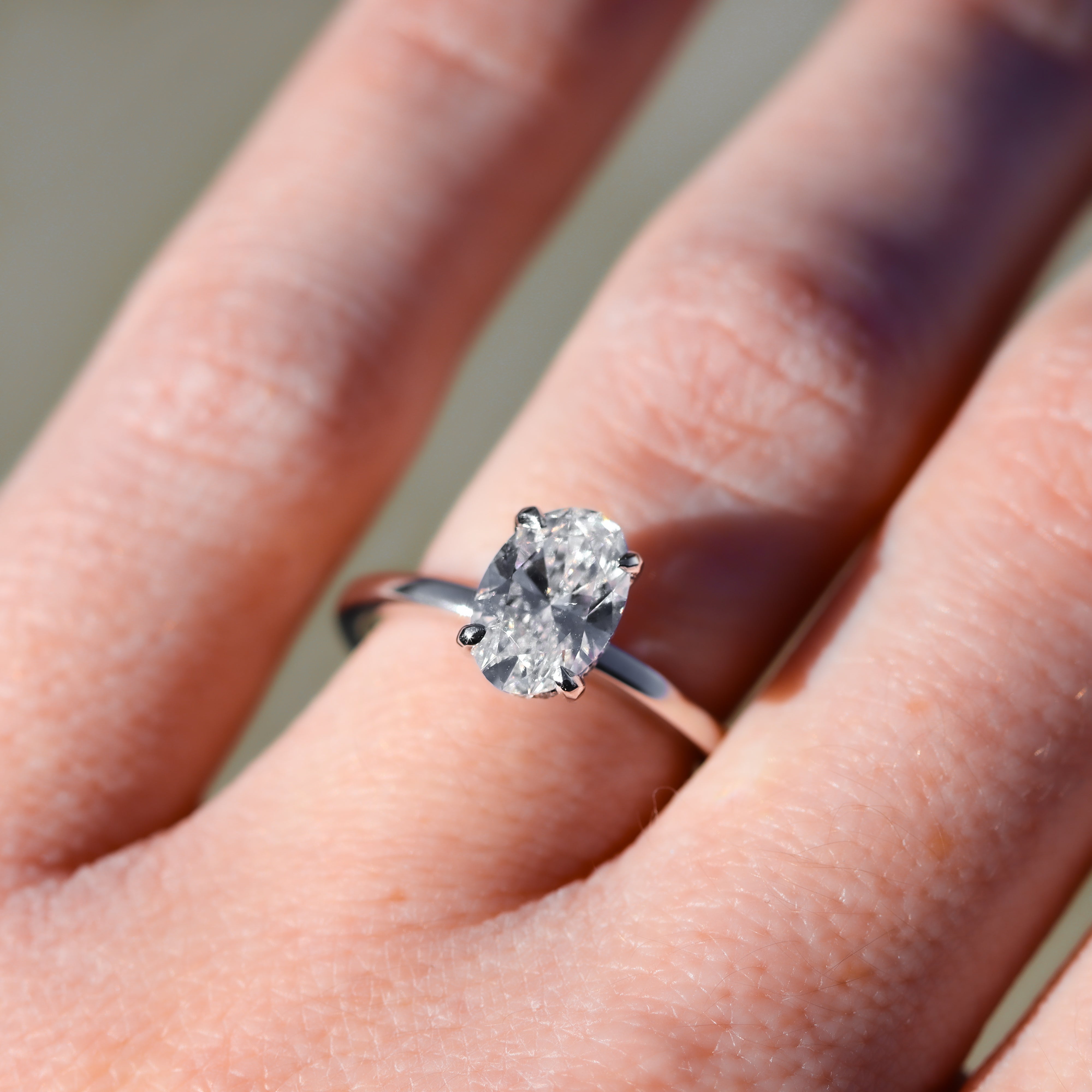 Oval Lab-Grown Diamond Ring on a hand