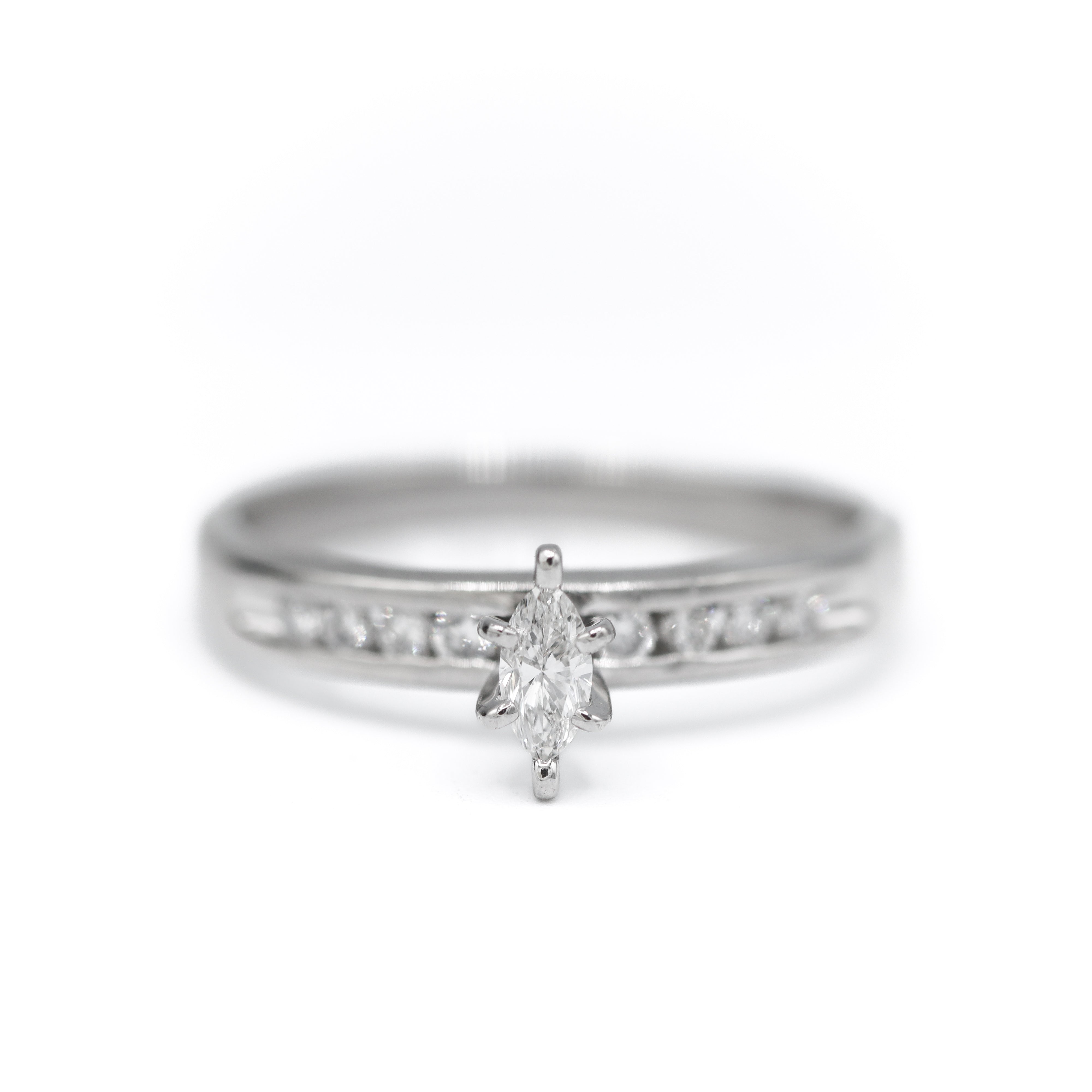 Estate Collection: Platinum 1/4CTW. Marquise-Cut Diamond Channel Set-Accent Ring