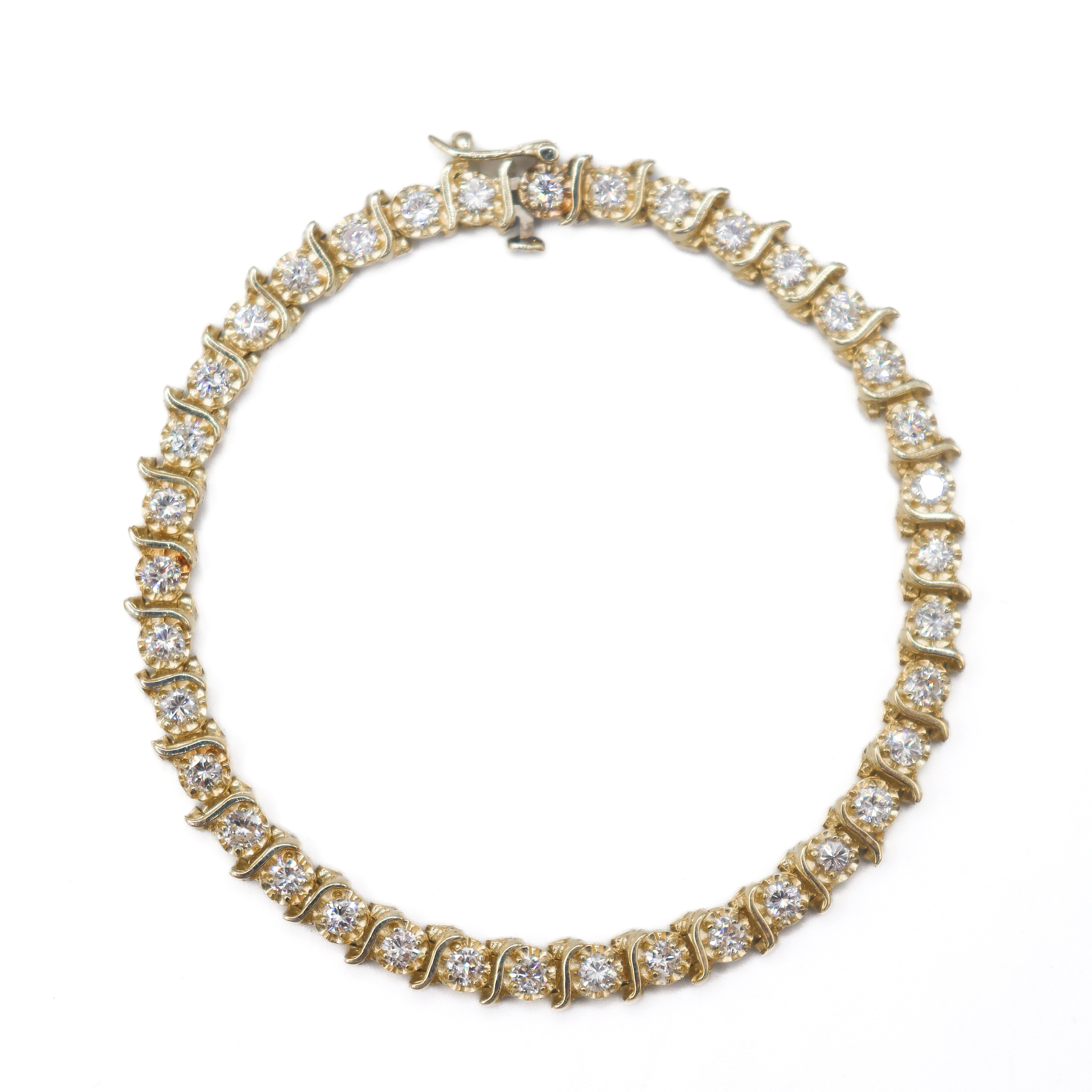 Estate Collection: 14K Yellow Gold S-Link 1-3/4CTW. Illusion-Set Diamond Tennis Bracelet