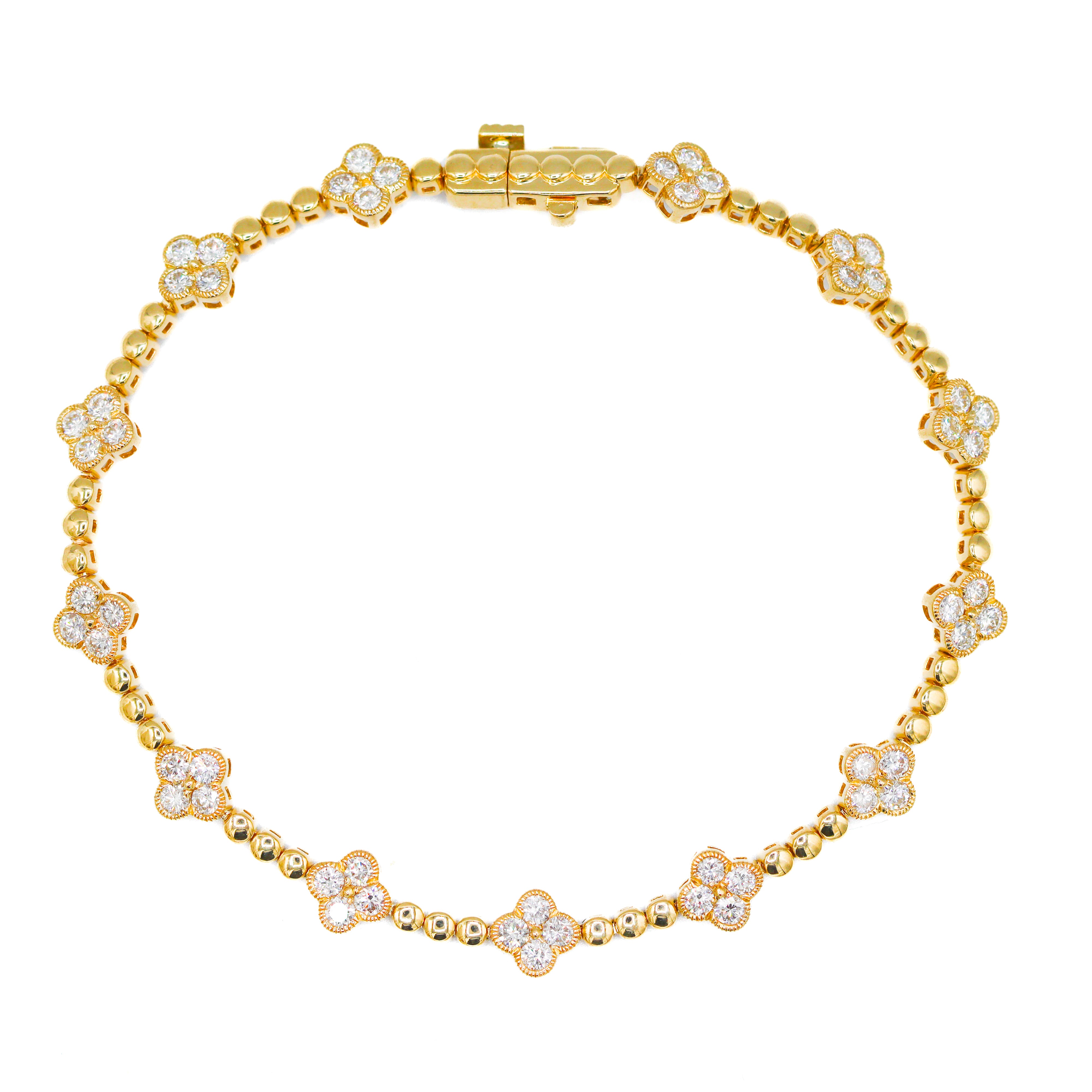 14K Yellow Gold Diamond Clover Station Tennis Bracelet on a white background