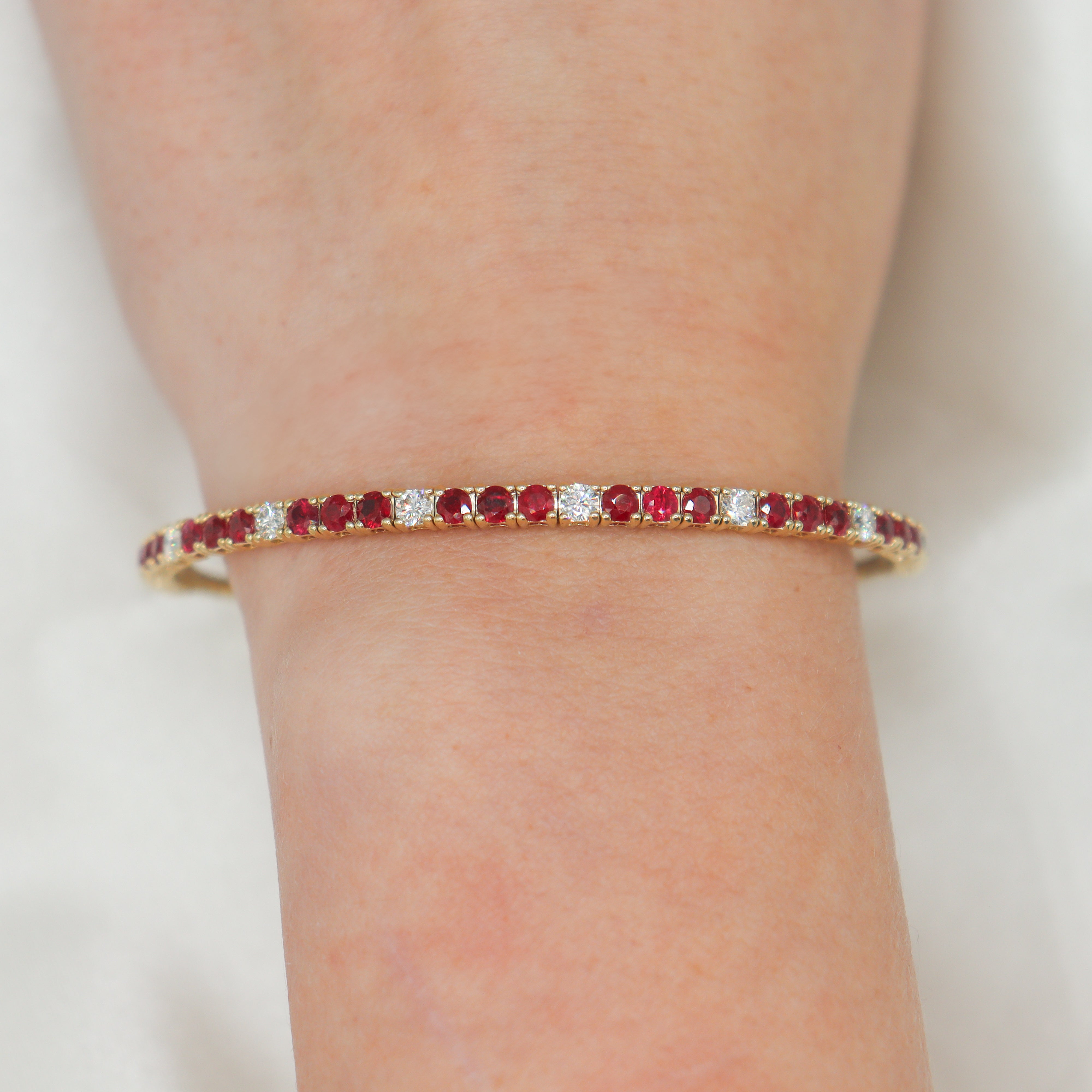 14K Yellow Gold 0.71CTW. Diamond & 2.42CTW. Ruby Flexi Bracelet on a wrist