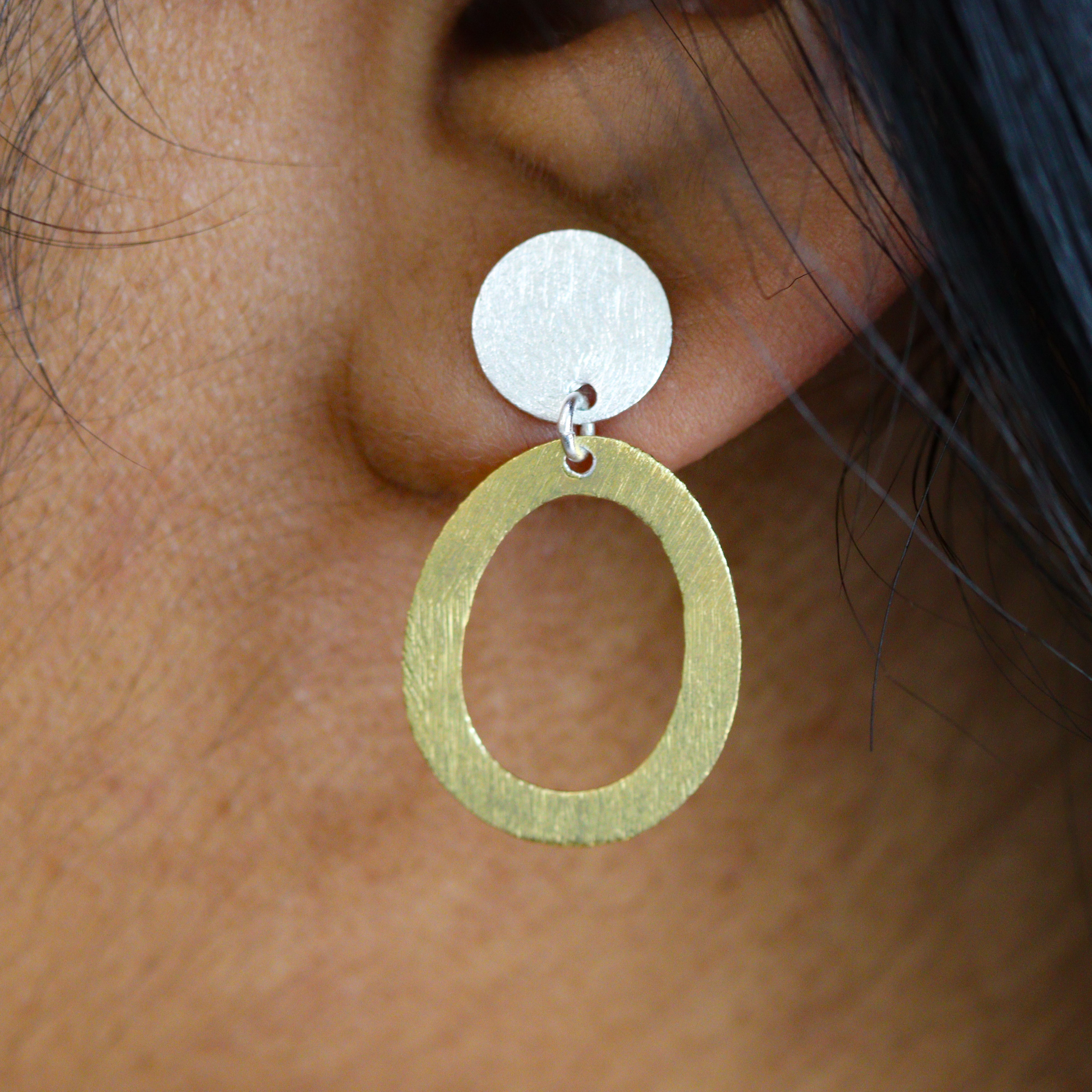Sterling Silver & Gold-Plated Disc Open-Oval Dangle Stud Earring on a model