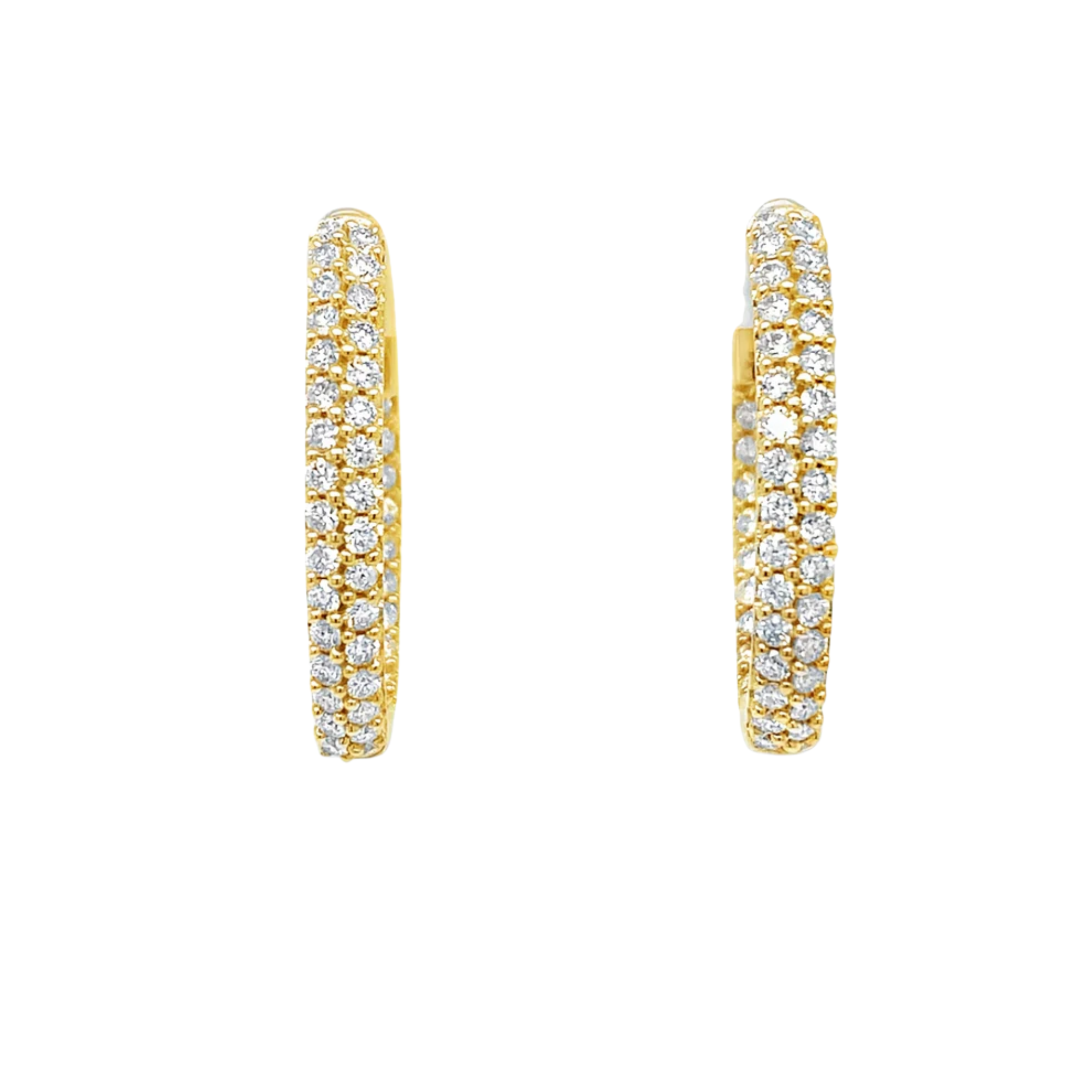 Gold hoop earrings with embedded diamonds on a white background