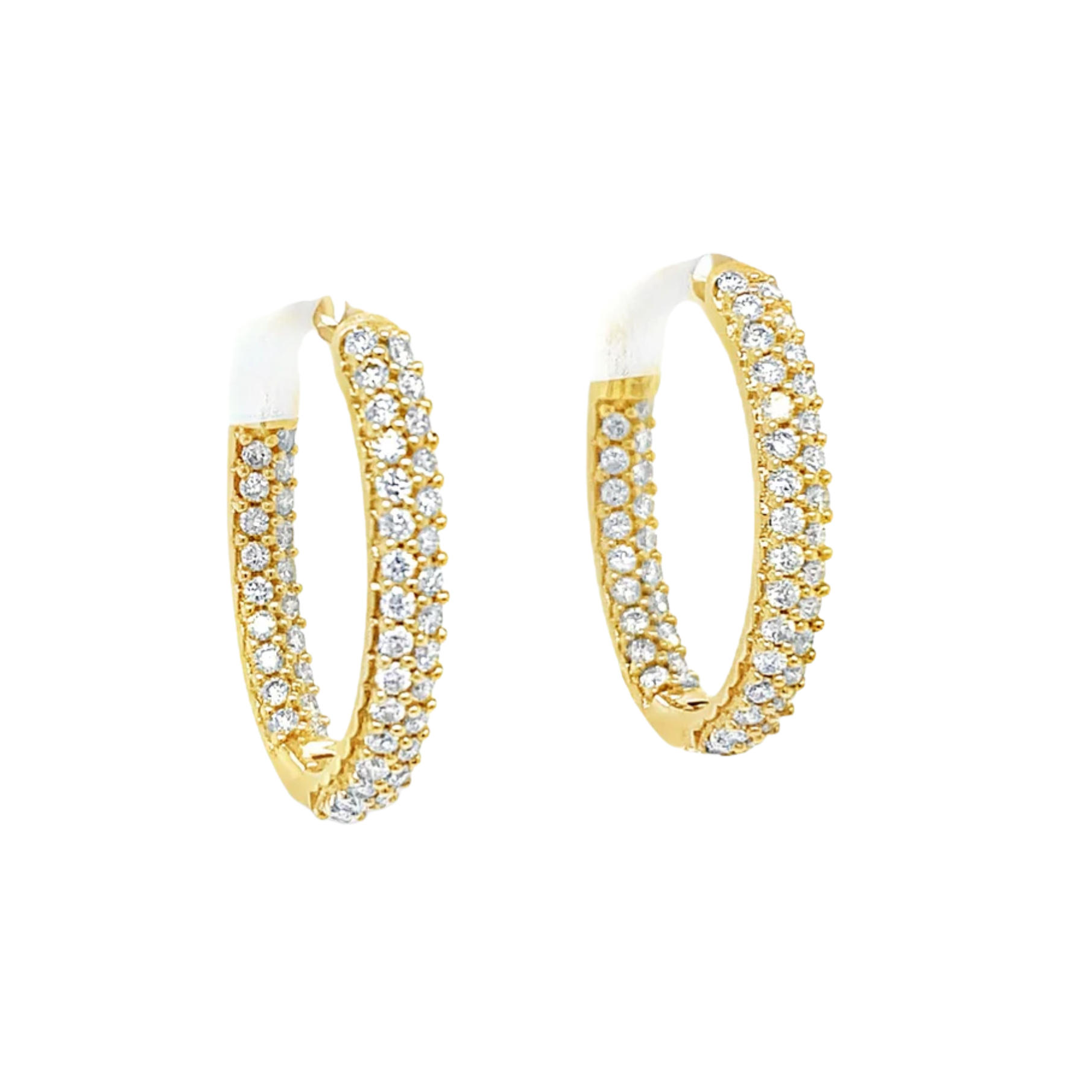 Gold hoop earrings with clear gemstones on a white background