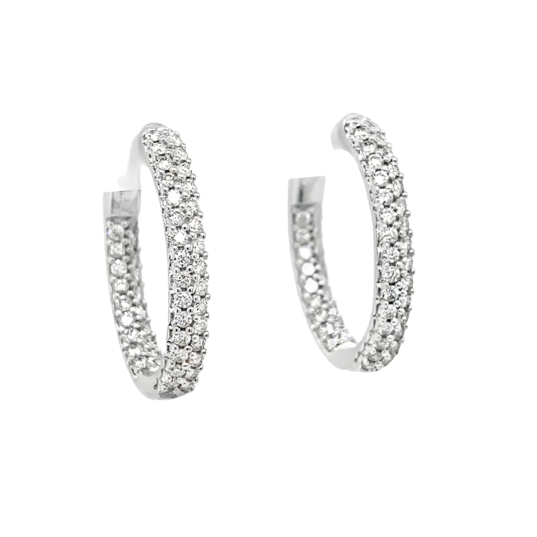 Pair of silver hoop earrings with clear stones on a white background